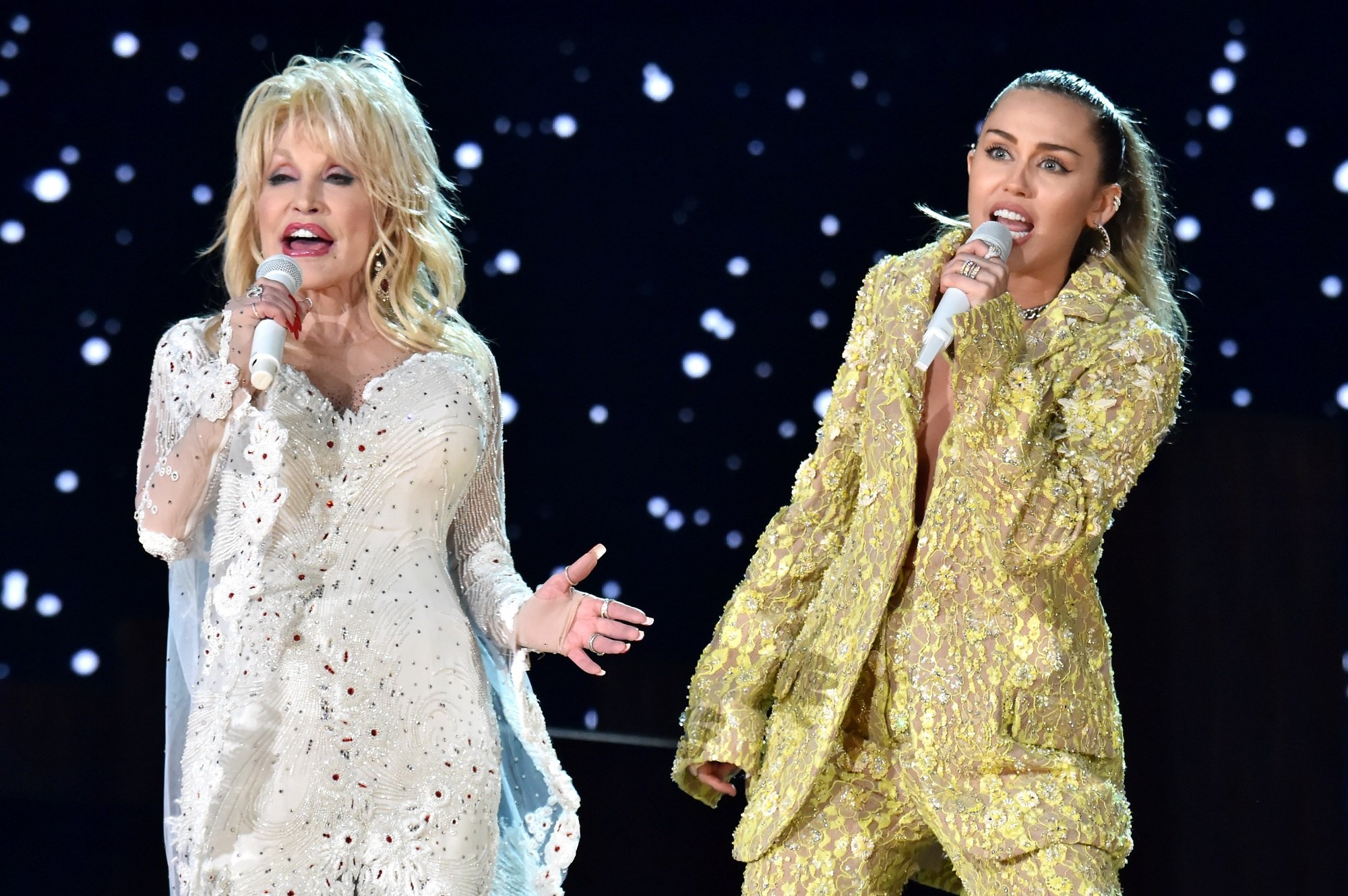 Dolly Parton (L) and Miley Cyrus perform onstage during the 61st Annual GRAMMY Awards on February 10, 2019