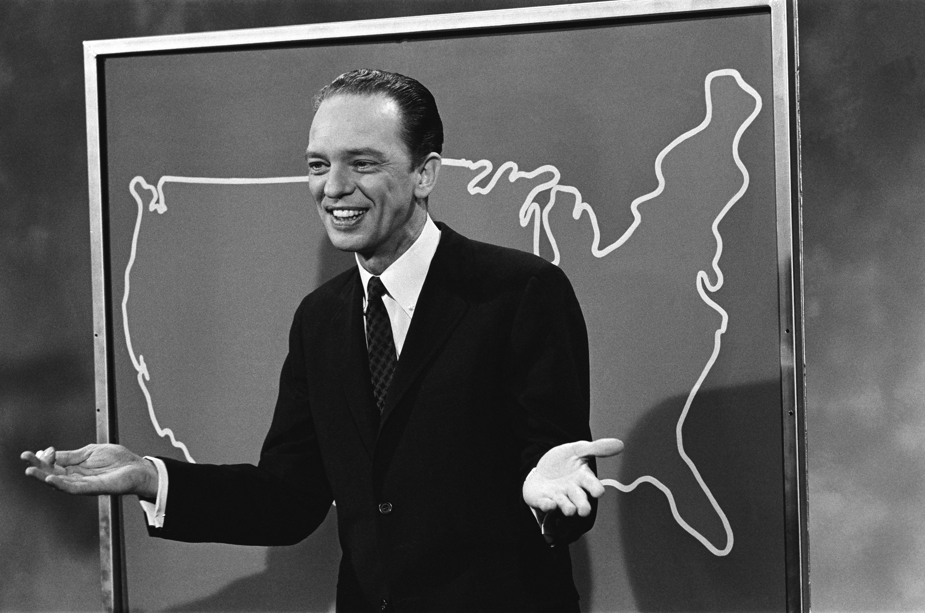 Don Knotts of The Andy Griffith Show in front of an outline of the United States