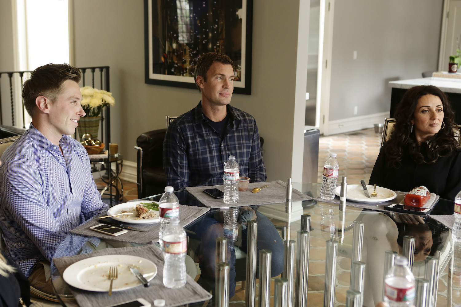 Gage Edwad, Jeff Lewis and Jenni Pulos sitting at a table 