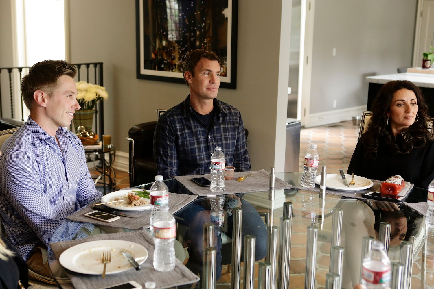 Gage Edwad, Jeff Lewis and Jenni Pulos sitting at a table
