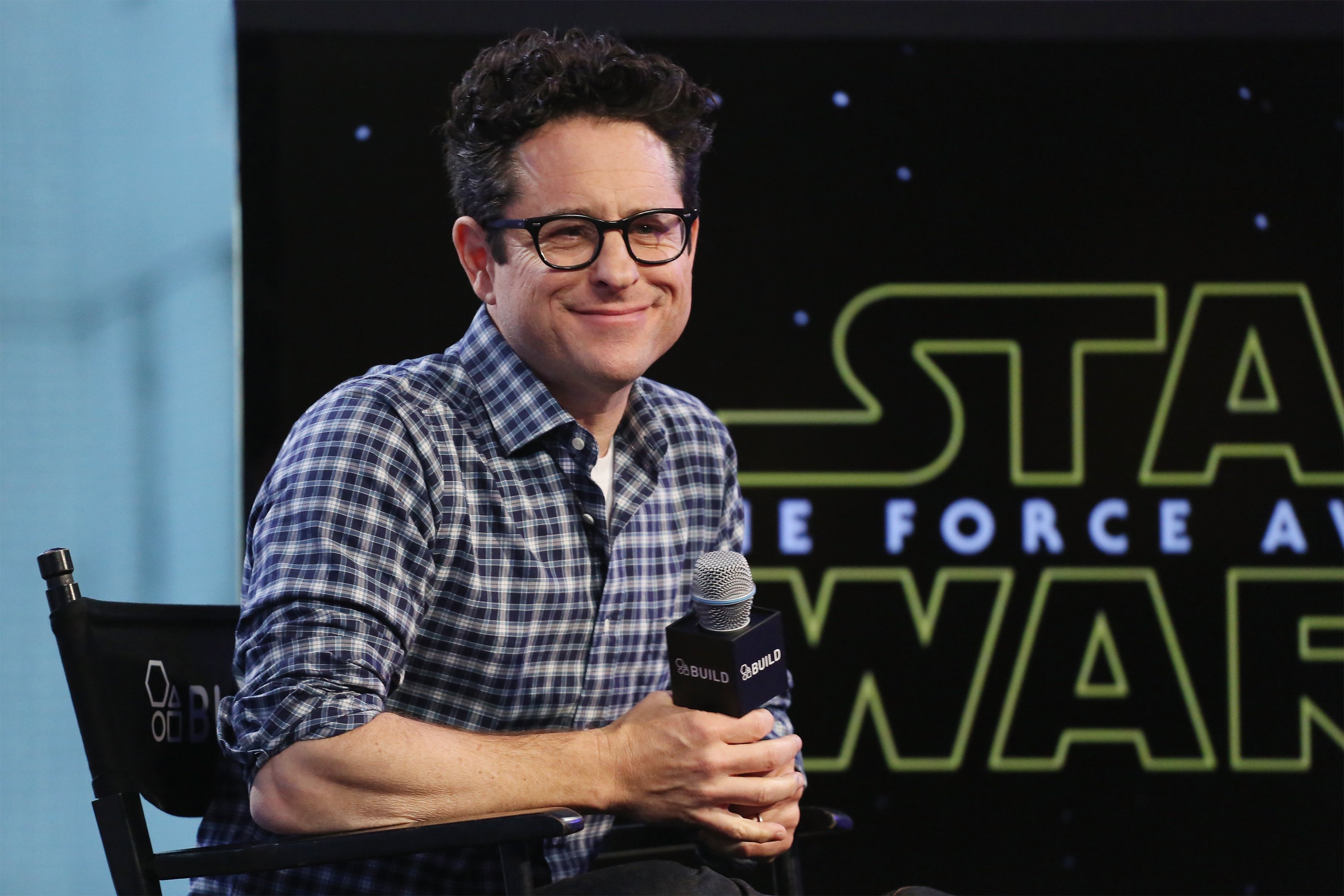 J. J. Abrams with a microphone