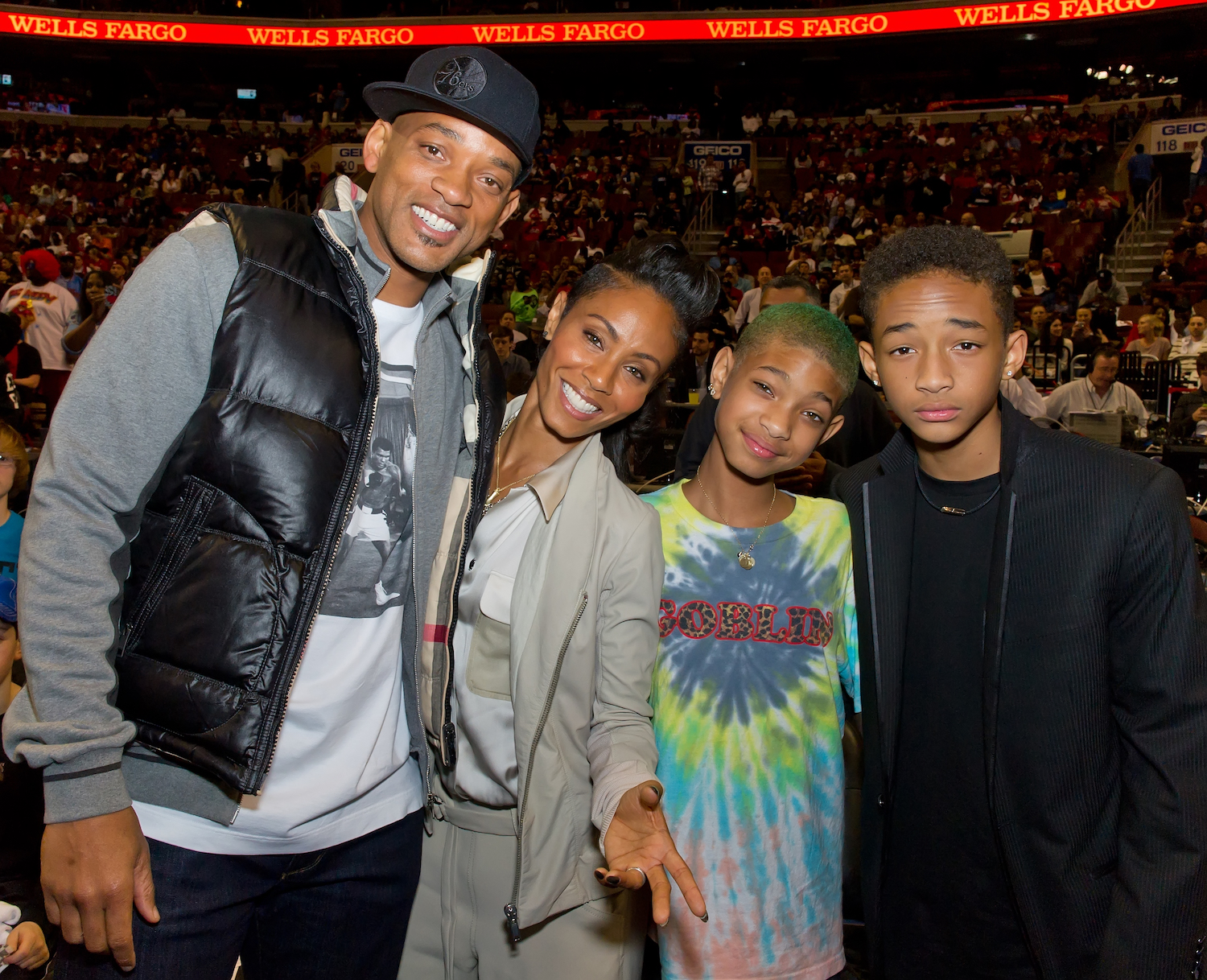 Will Smith, Jada Pinkett Smith, Willow Smith, and Jaden Smith attend the Miami Heat vs. the Philadelphia 76ers game at Wachovia Center on March 16, 2012