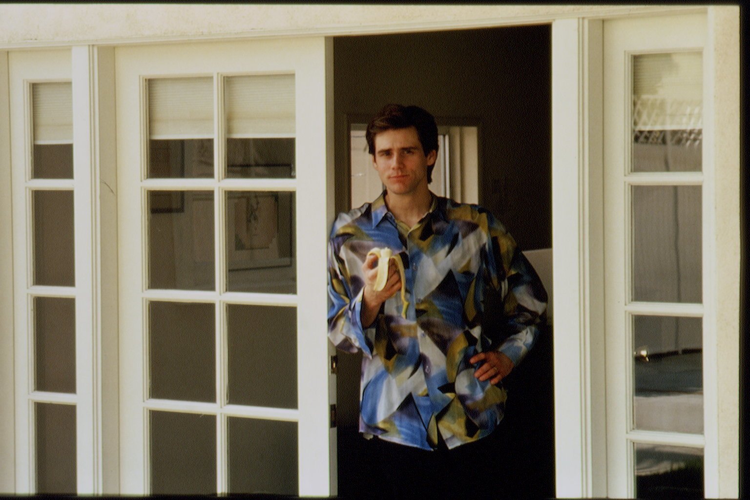 Jim Carrey holding a banana