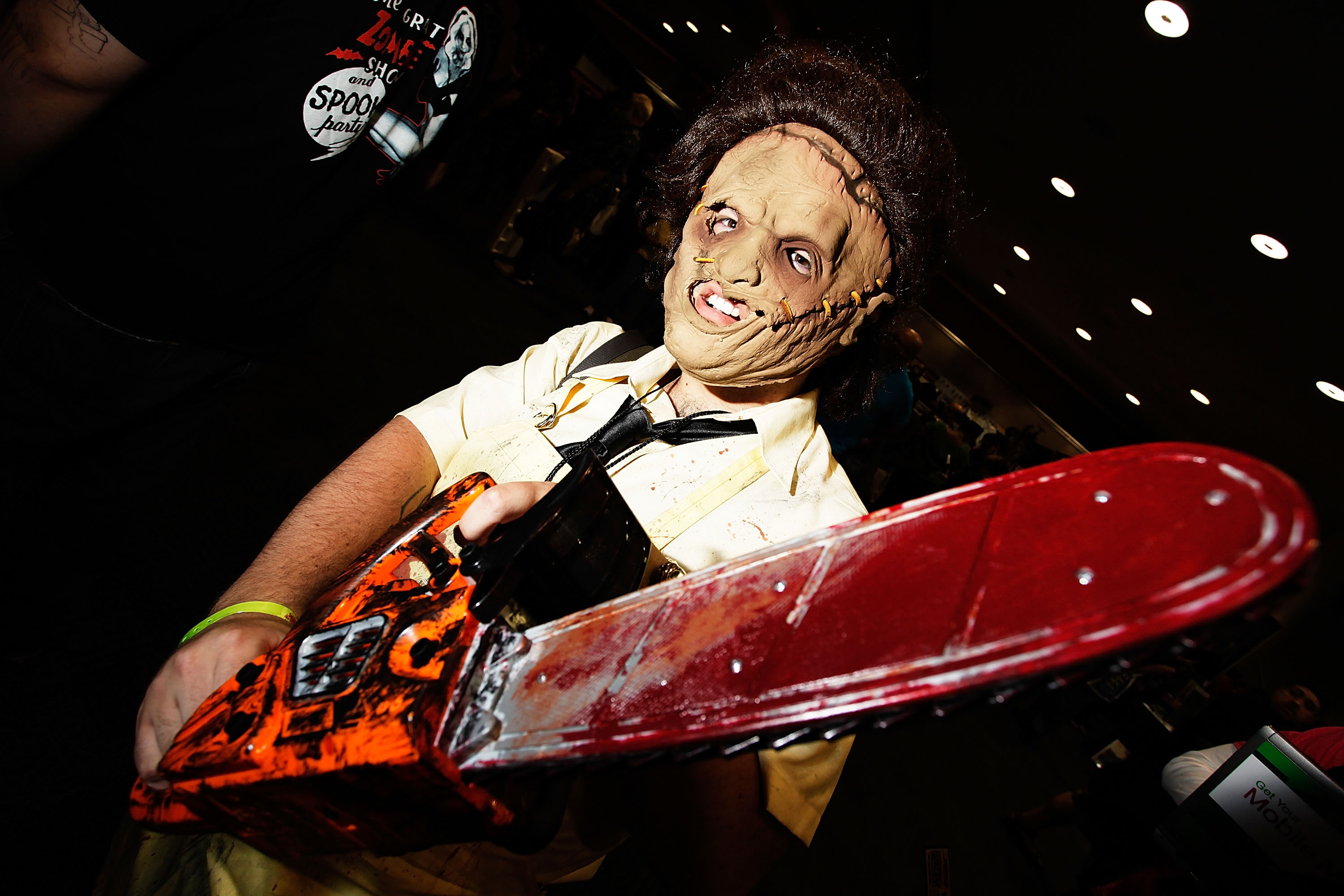 A Leatherface cosplayer with a chain saw
