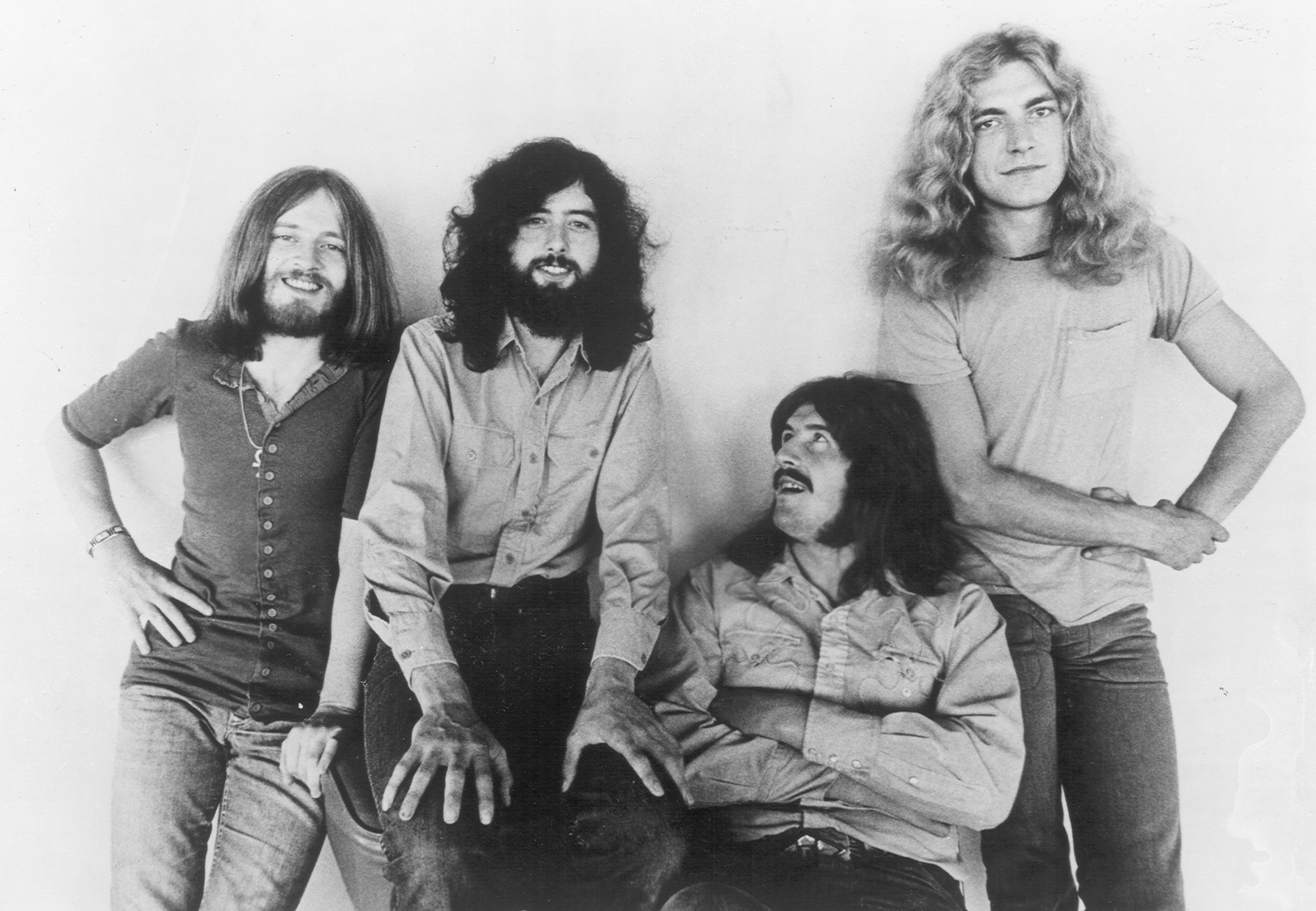 Led Zeppelin leaning against a wall