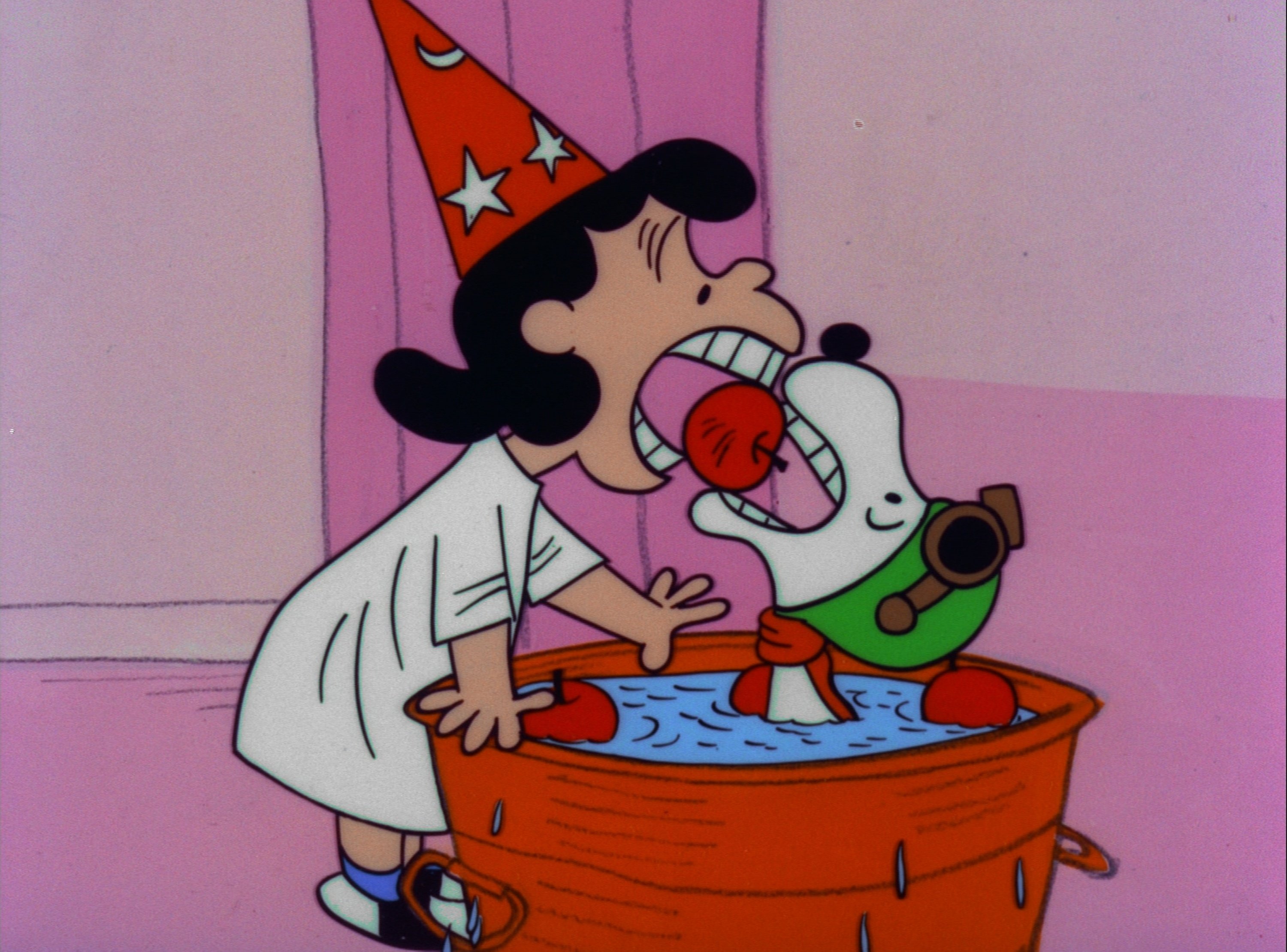 Lucy and Snoopy bite into the same apple