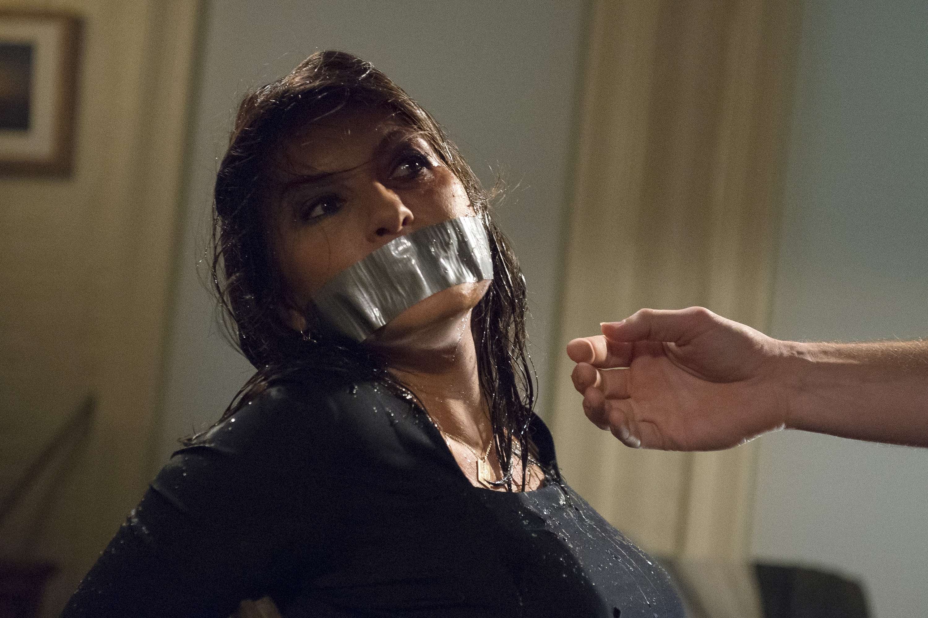 Olivia Benson with duct tape on mouth 