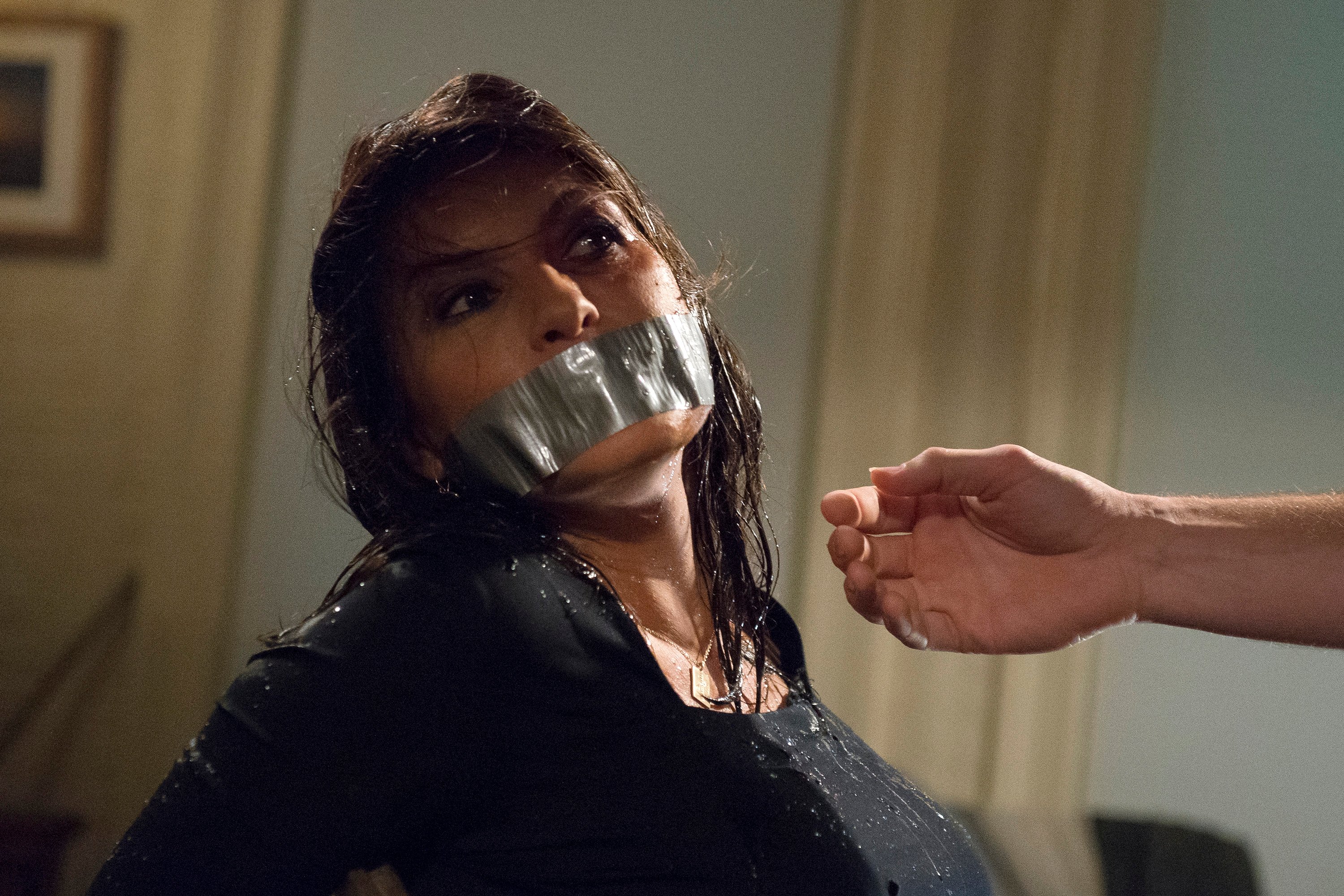 Olivia Benson with duct tape on mouth