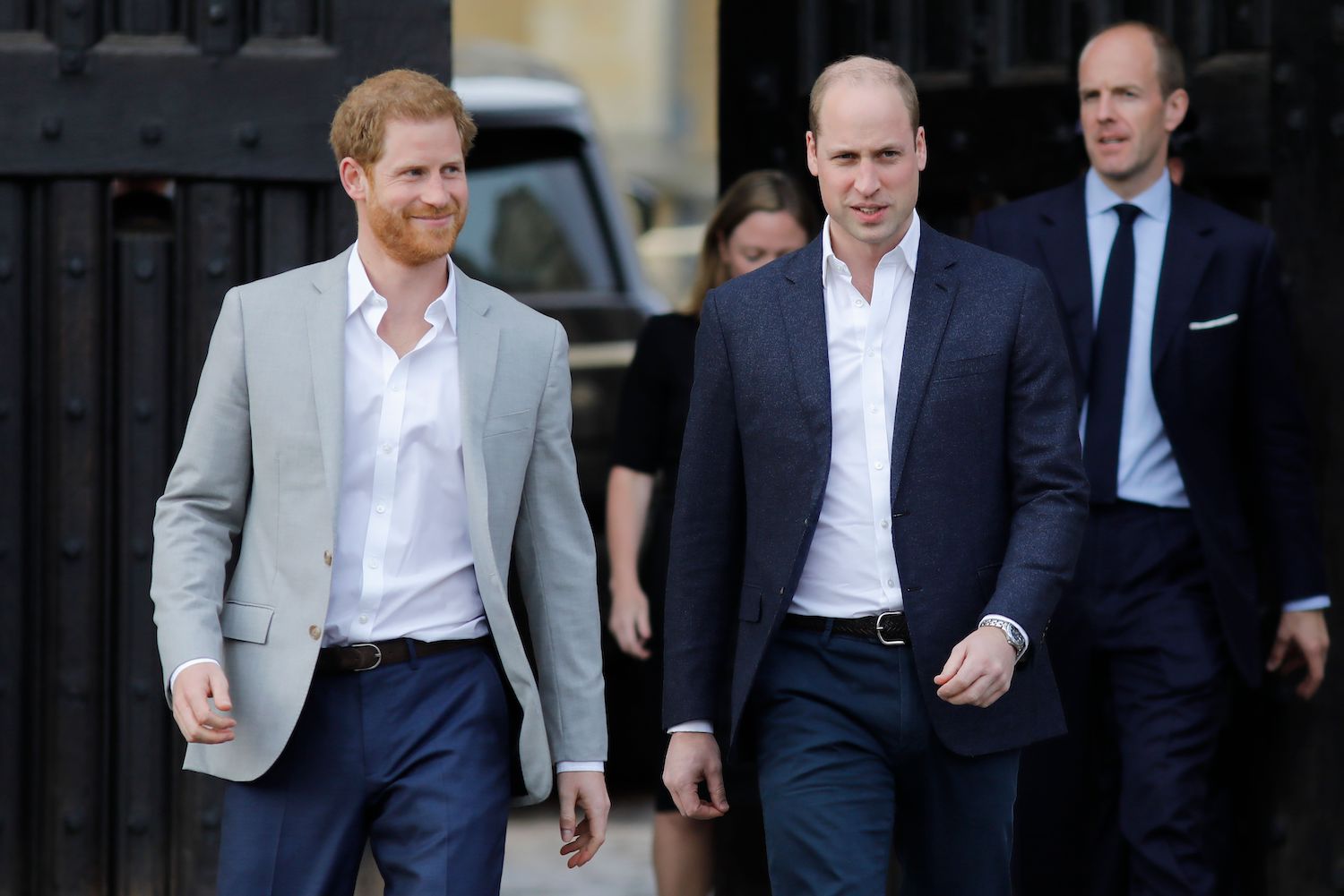 Prince Harry and Prince William arrive to greet well-wishers on the street outside Windsor Castle in Windsor on May 18, 2018, the eve of Prince Harry's royal wedding to Meghan Markle