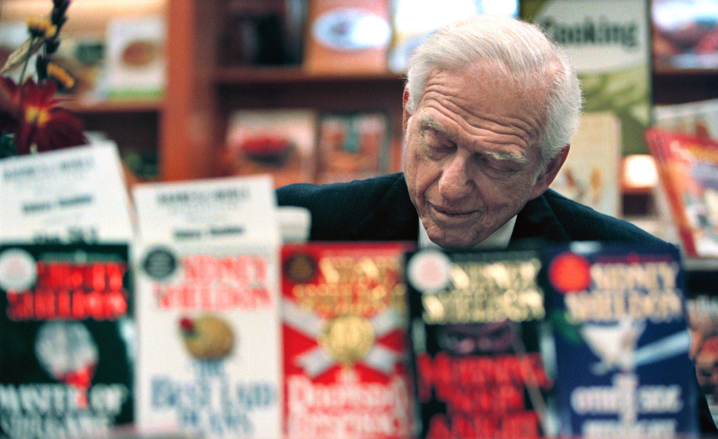 Sidney Sheldon with books
