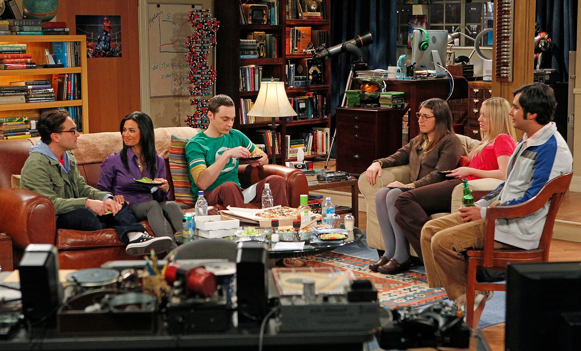 The cast of 'The Big Bang Theory' enjoys a meal in Leonard and Sheldon's living room