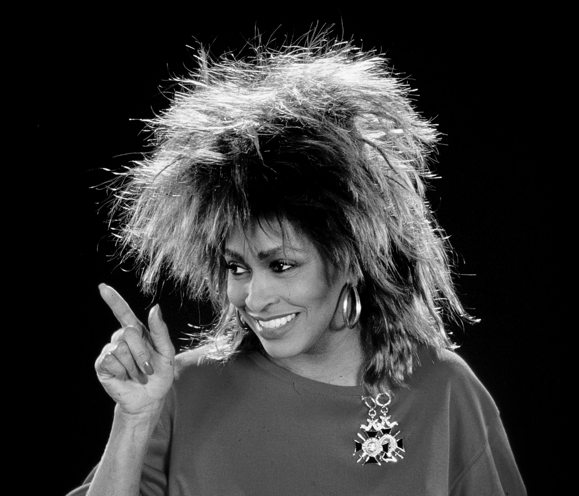 Tina Turner wearing earrings