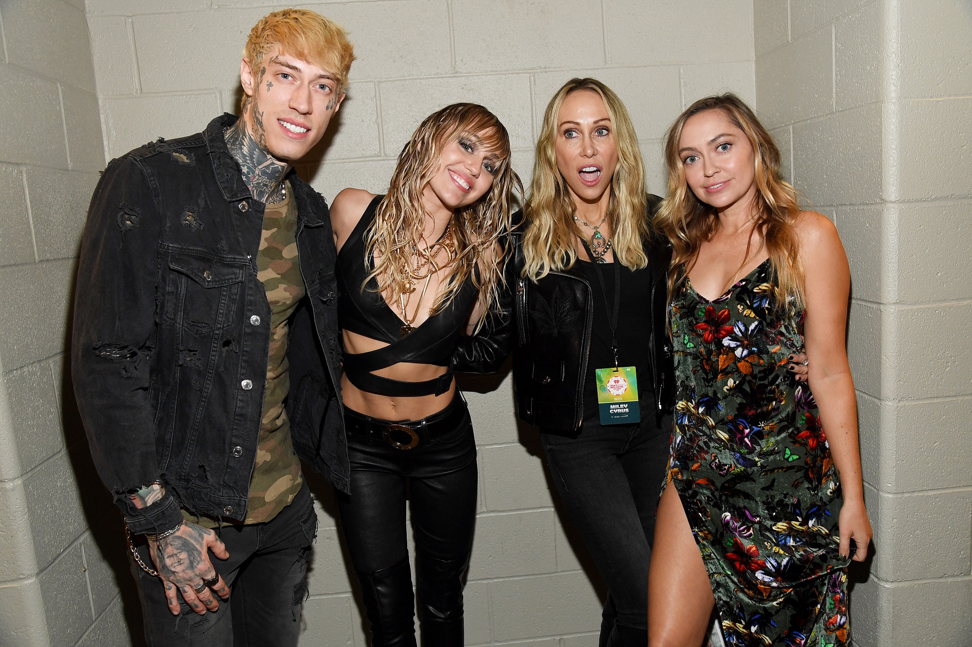(L-R) Trace Cyrus, Miley Cyrus, Tish Cyrus, and Brandi Cyrus pose backstage during the 2019 iHeartRadio Music Festival on September 21, 2019, in Las Vegas, Nevada.