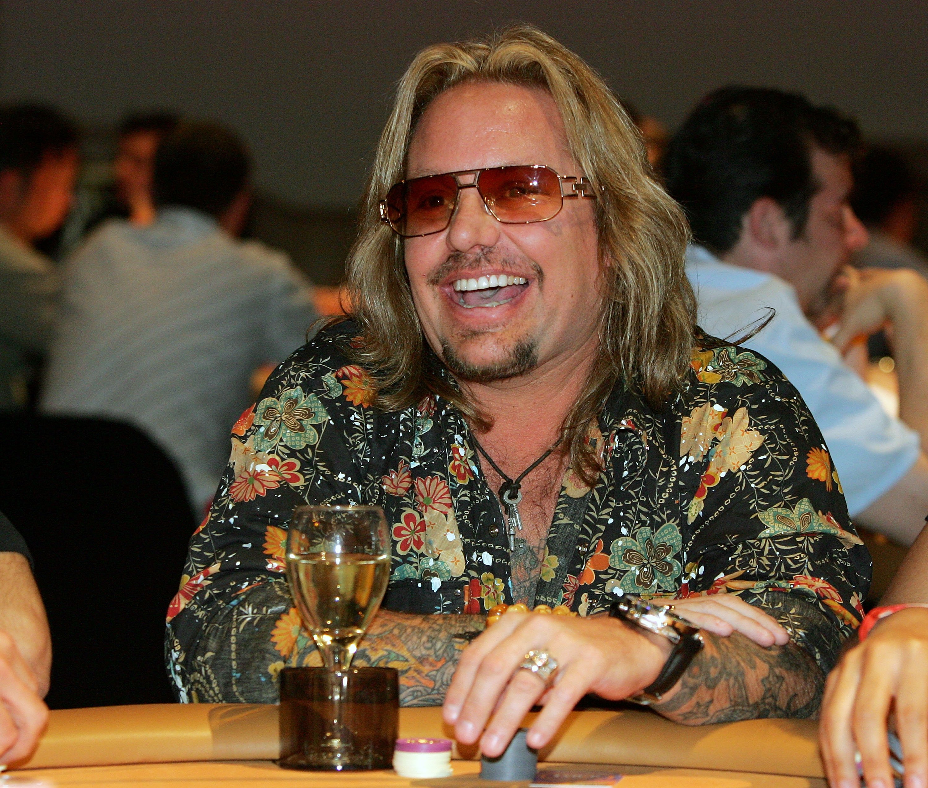 Vince Neil at a table
