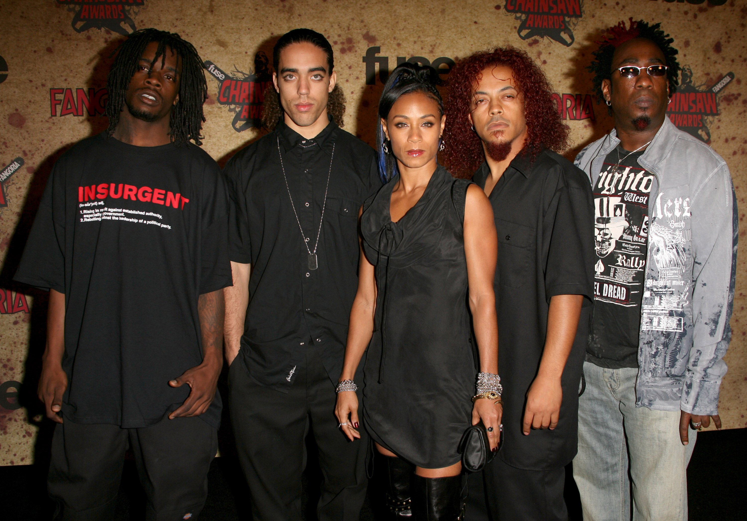 The members of Wicked Wisdom mostly wearing black