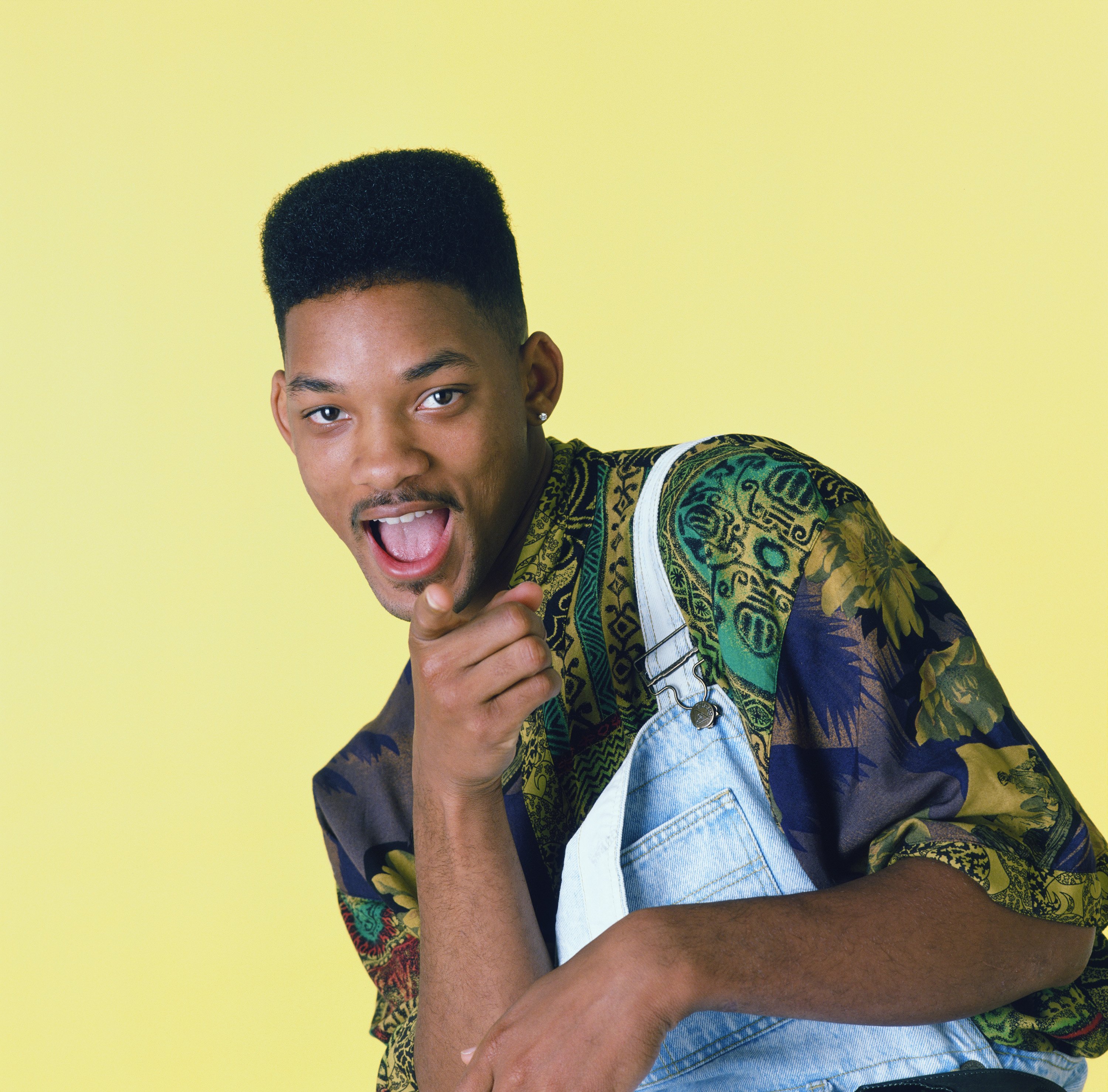 Will Smith in front of a yellow background