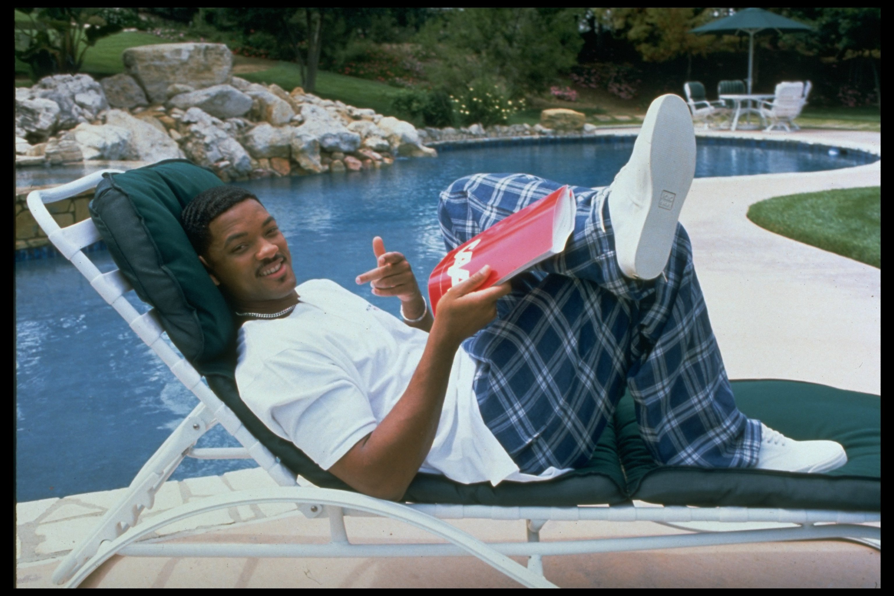 Will Smith near a pool