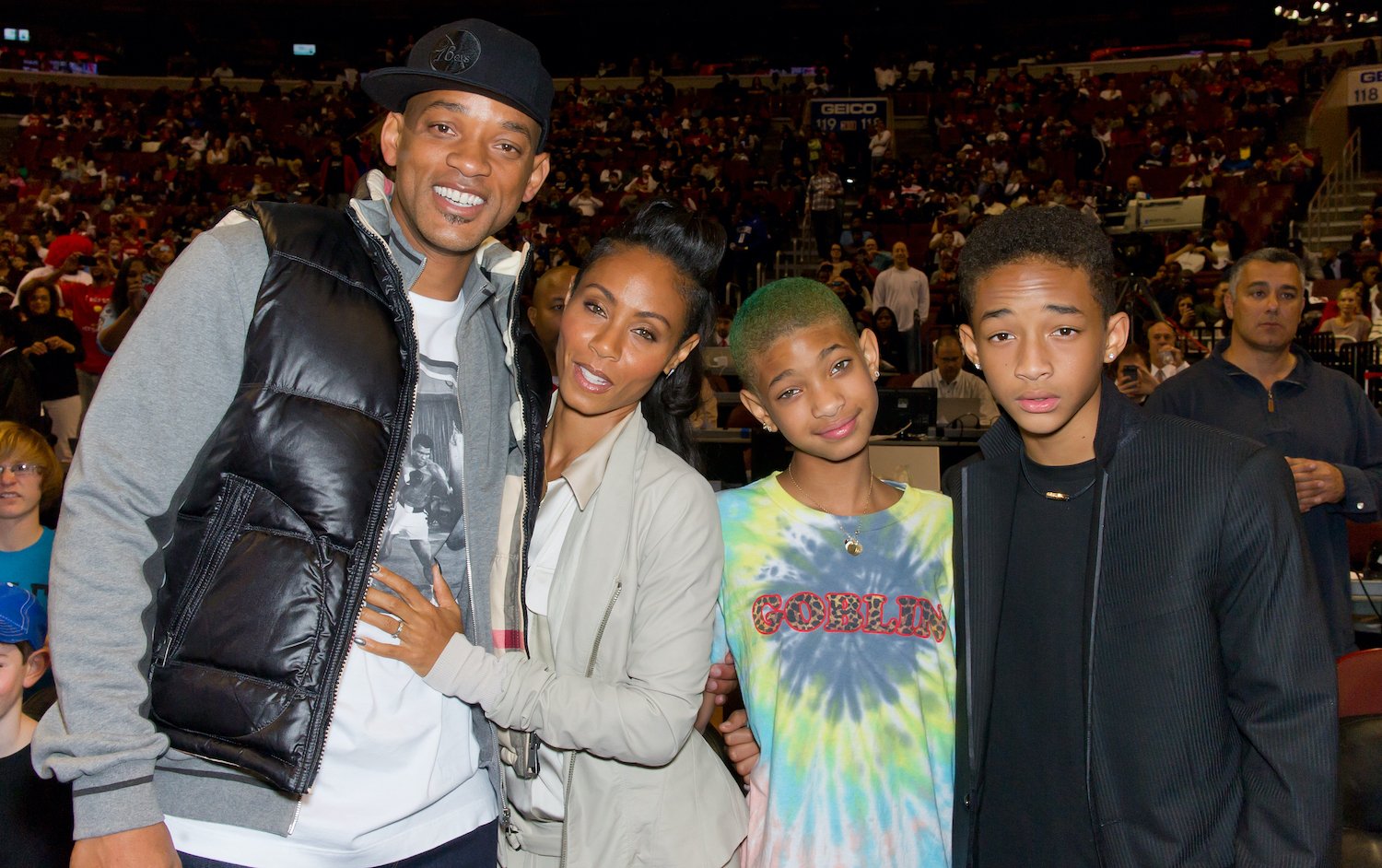 Will Smith, Jada Pinkett Smith, Willow Smith, and Jaden Smith attend the Miami Heat vs. the Philadelphia 76ers game in 2012