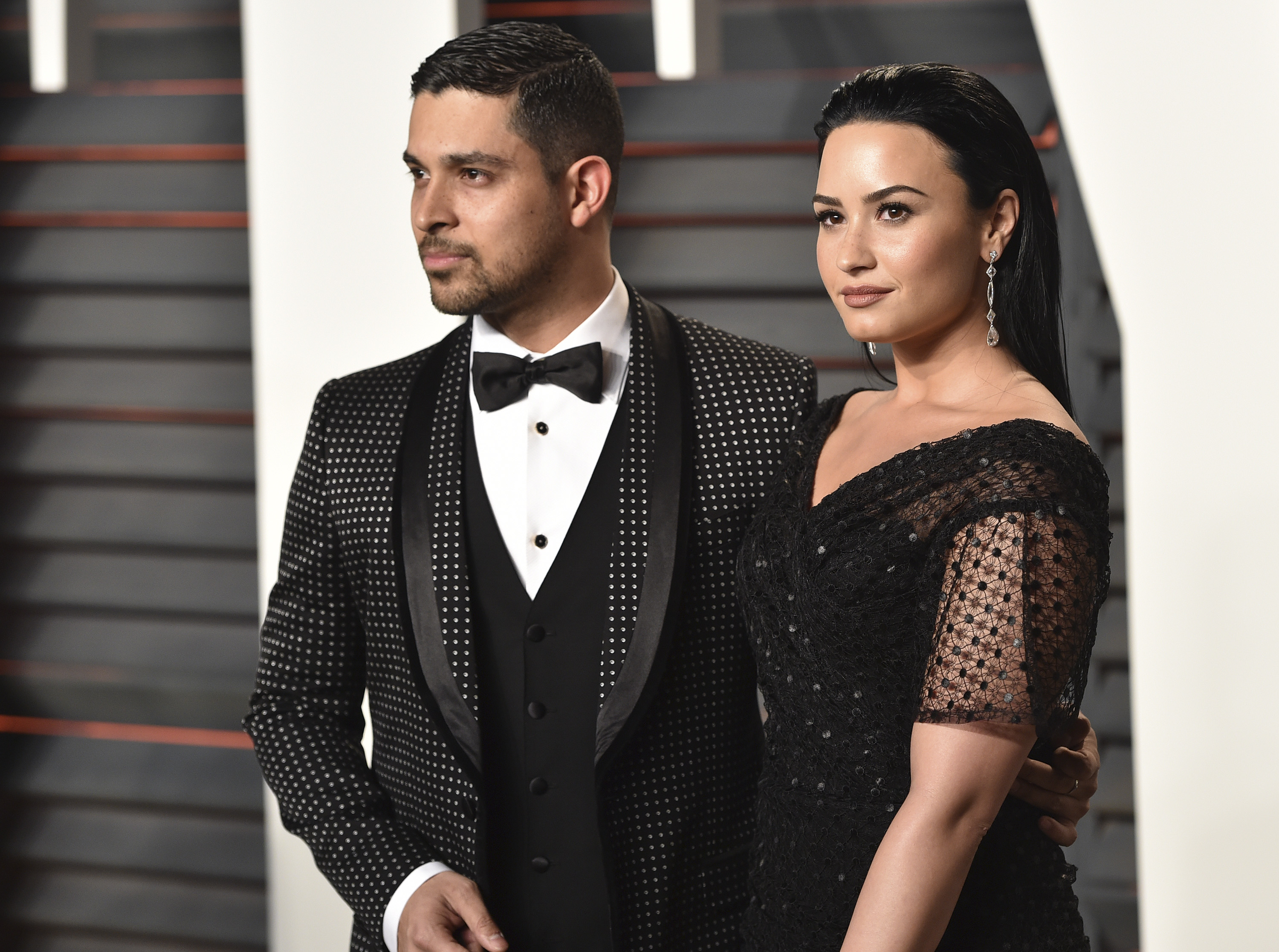 Wilmer Valderrama (L) and Demi Lovato 