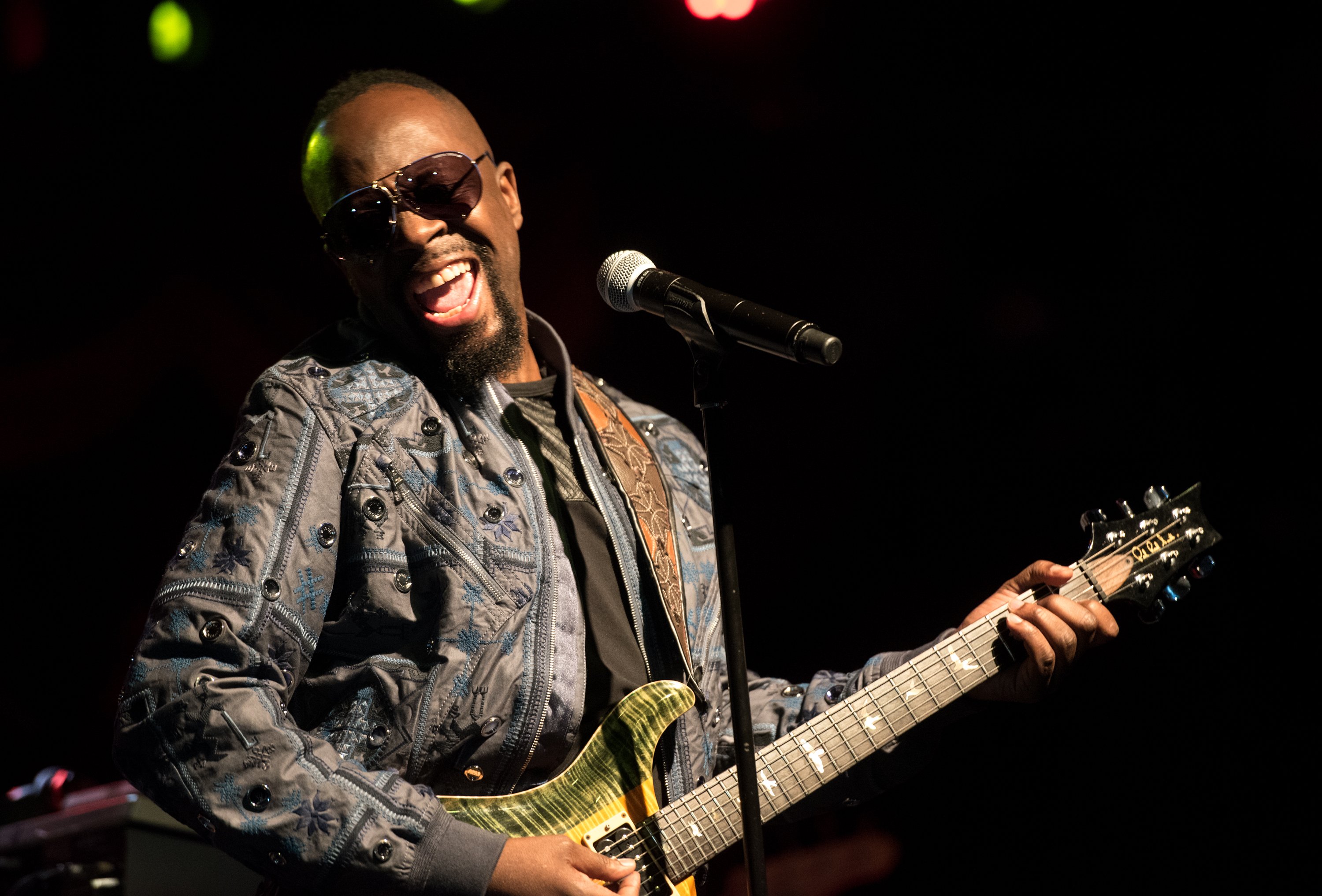 Wyclef Jean with a guitar