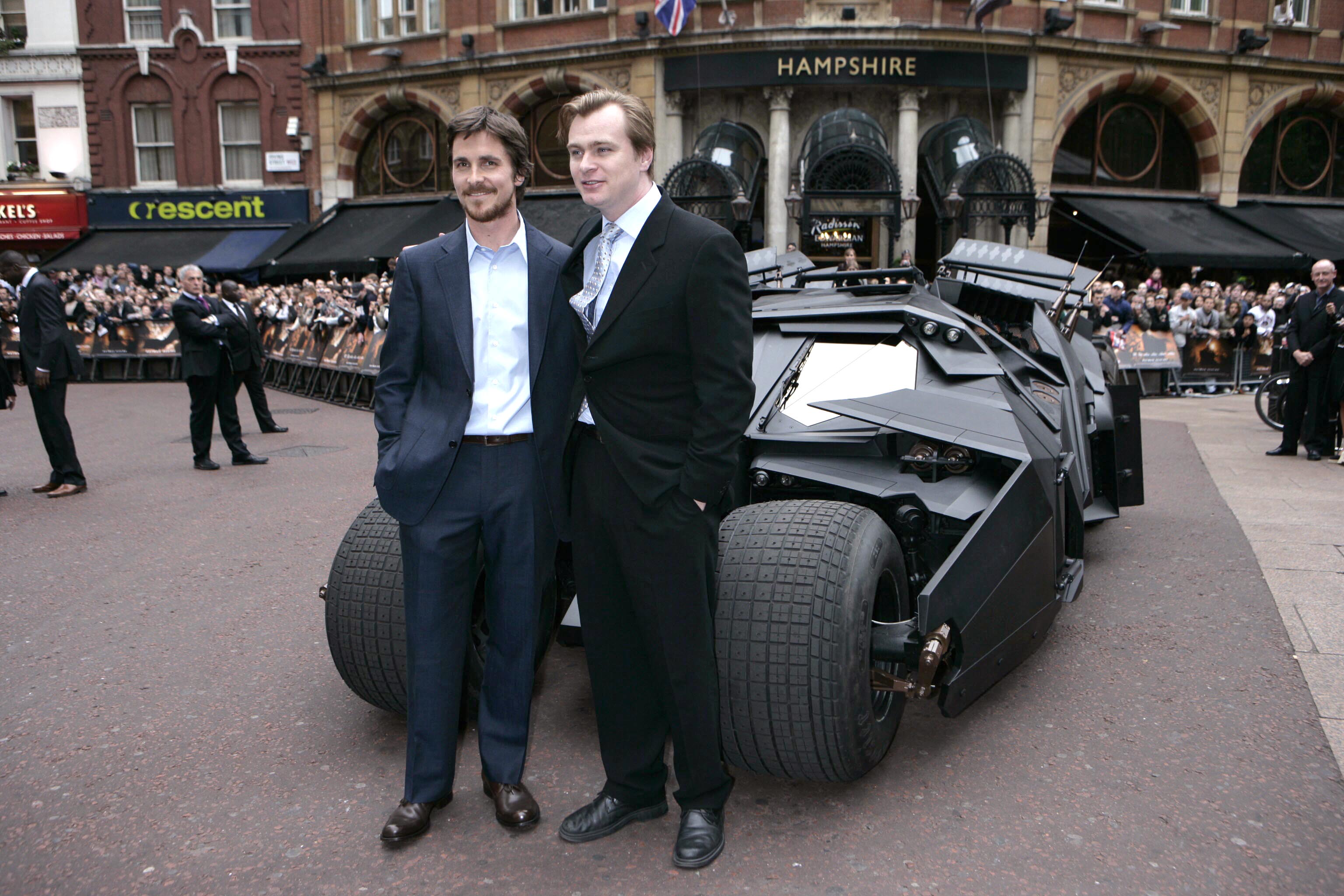 Christopher Nolan with Christian Bale and the batmobile