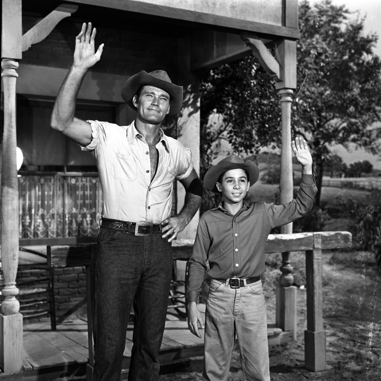 Chuck Connors smiles on the set of 'The Rifleman'