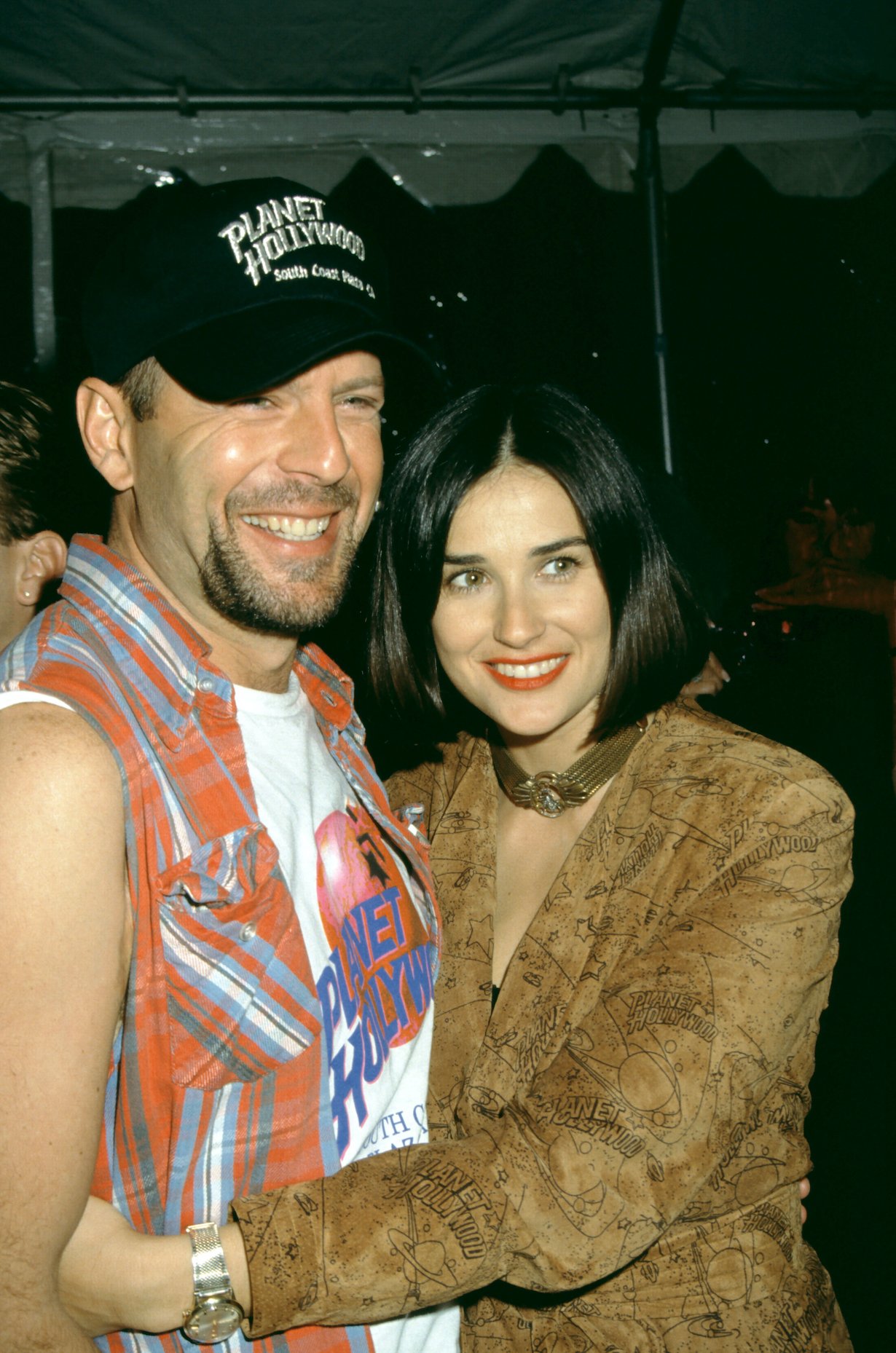 Demi Moore and actor Bruce Willis in 1992 at Planet Hollywood, South Coast Plaza in Costa Mesa, California