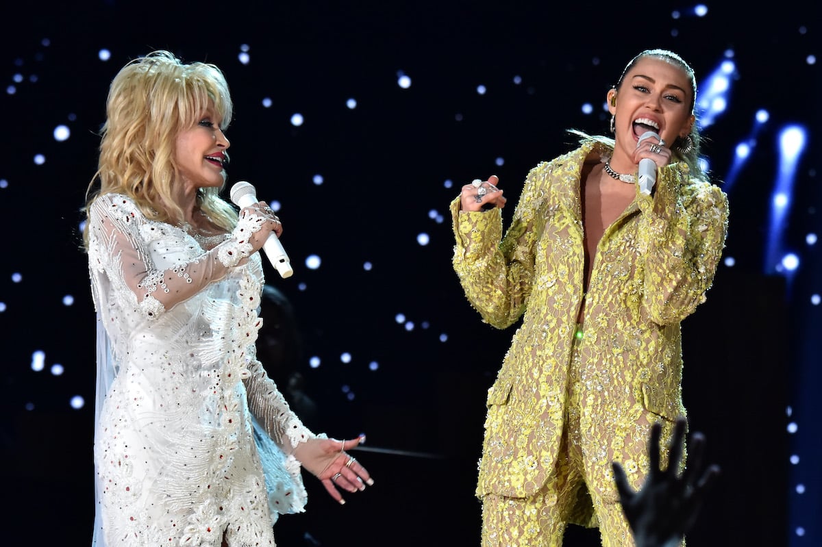 Dolly Parton and Miley Cyrus perform onstage