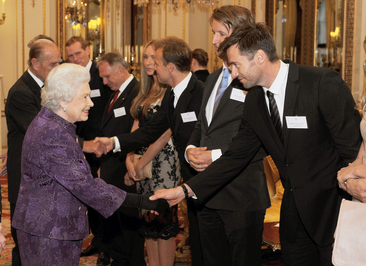 Queen Elizabeth II and Hugh Jackman at Buckingham Palace