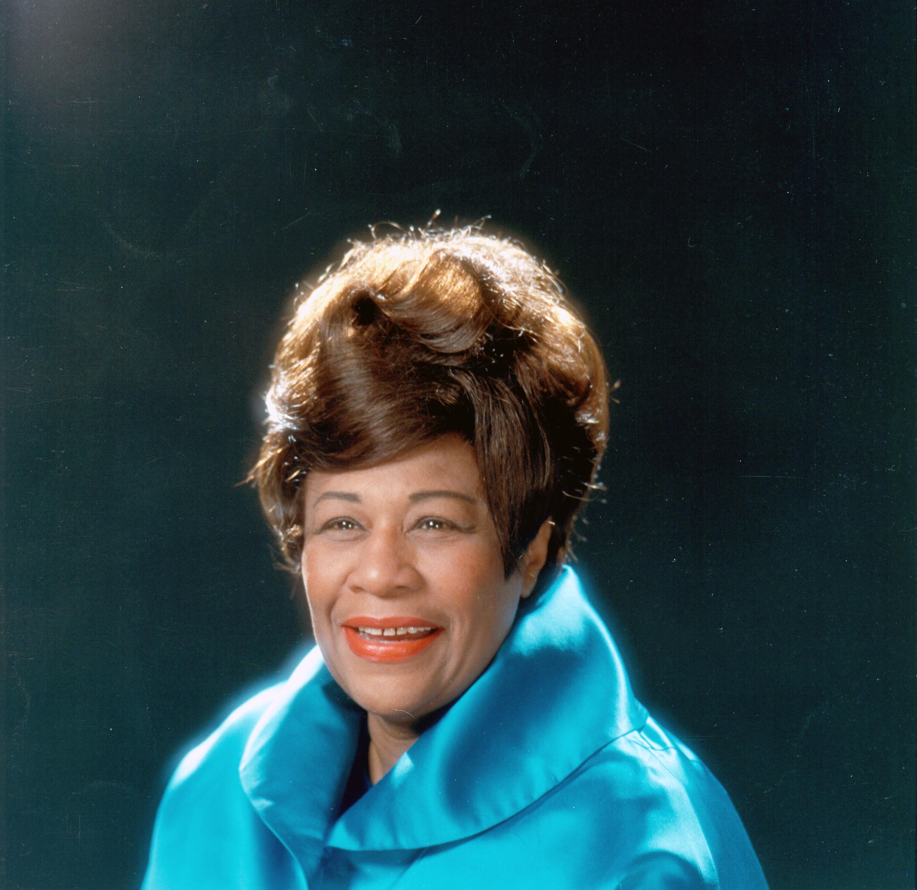 Ella Fitzgerald smiles for a photo