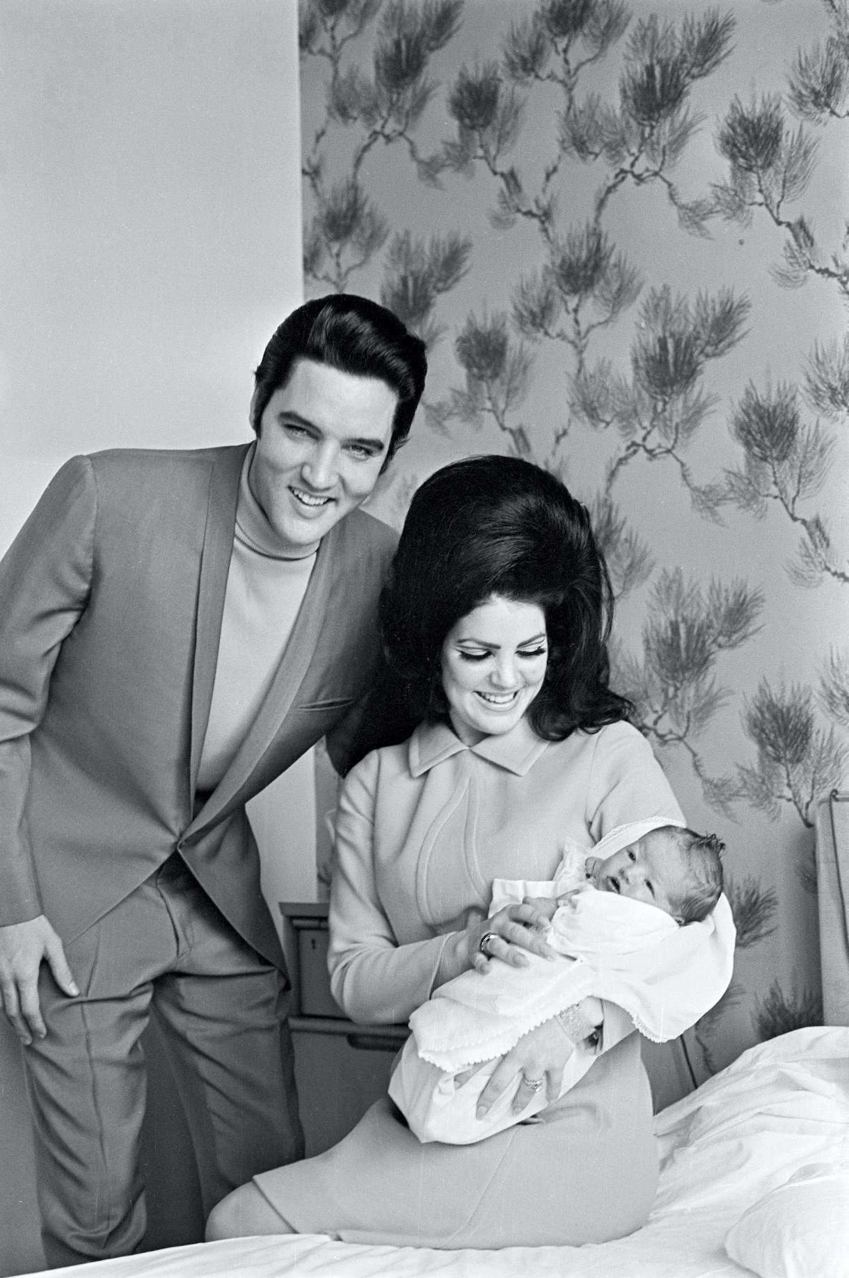 Elvis Presley with Priscilla and their four day old daughter Lisa Marie