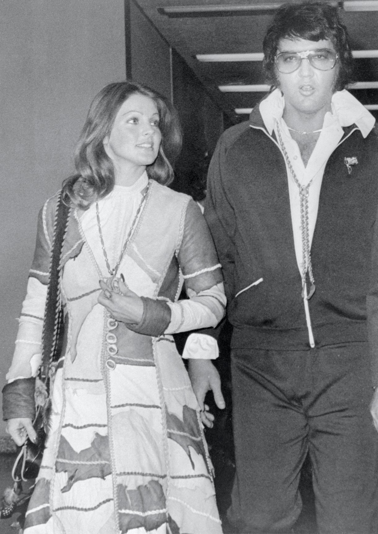 Elvis Presley leaves Santa Monica California Superior Court after being granted a divorce from his wife Priscilla