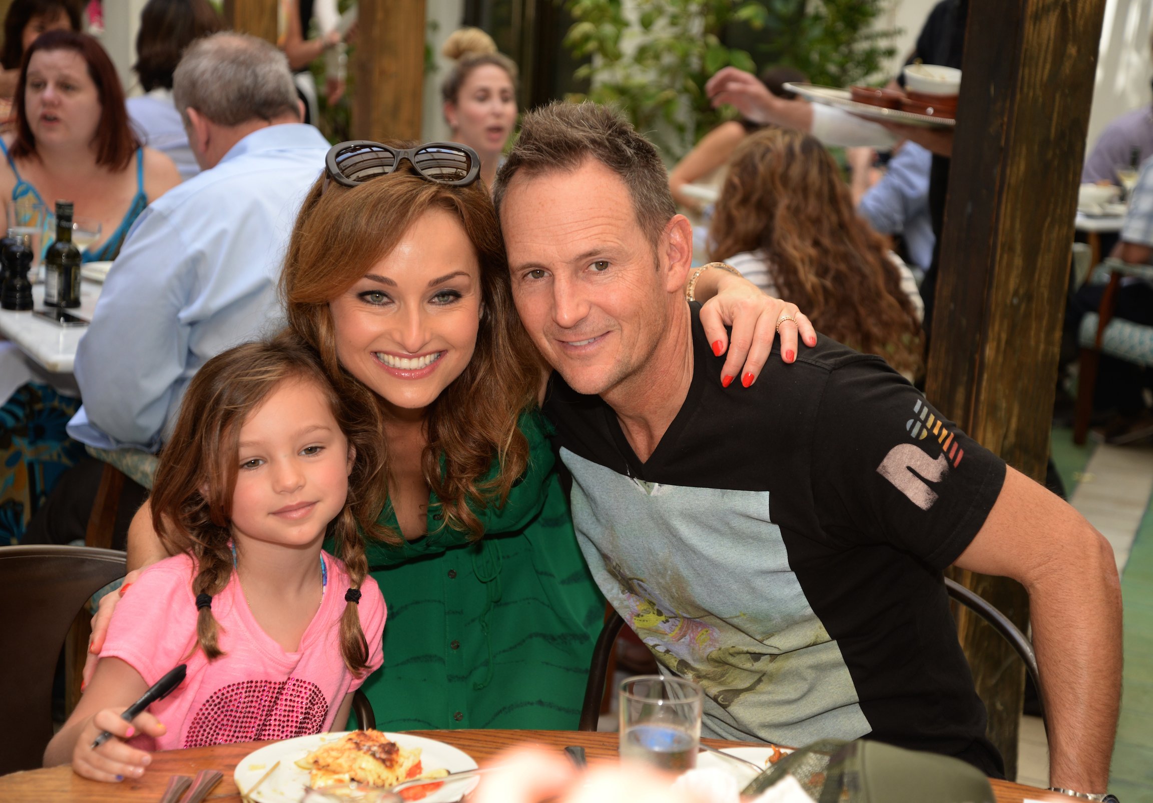 Giada De Laurentiis from the Food Network, Todd Thompson, and their daughter, Jade 