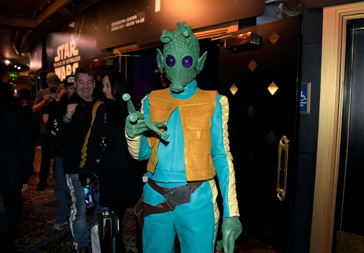A fan dressed as the 'Star Wars' character Greedo