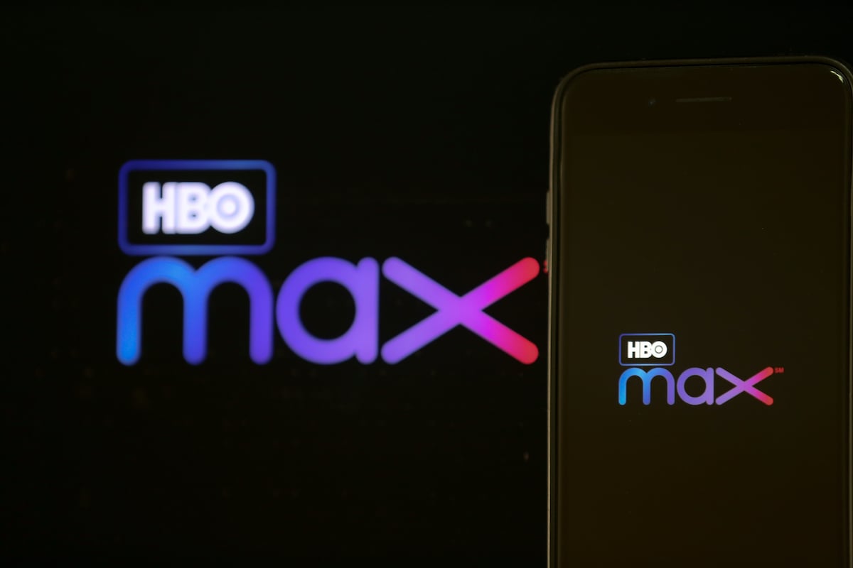 HBO Max logos displayed on a mobile phone and a laptop screen