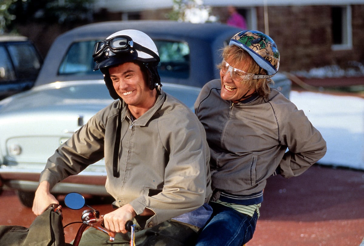 Jim Carrey and Jeff Daniels riding bike in a scene from the film 'Dumb & Dumber', 1994.