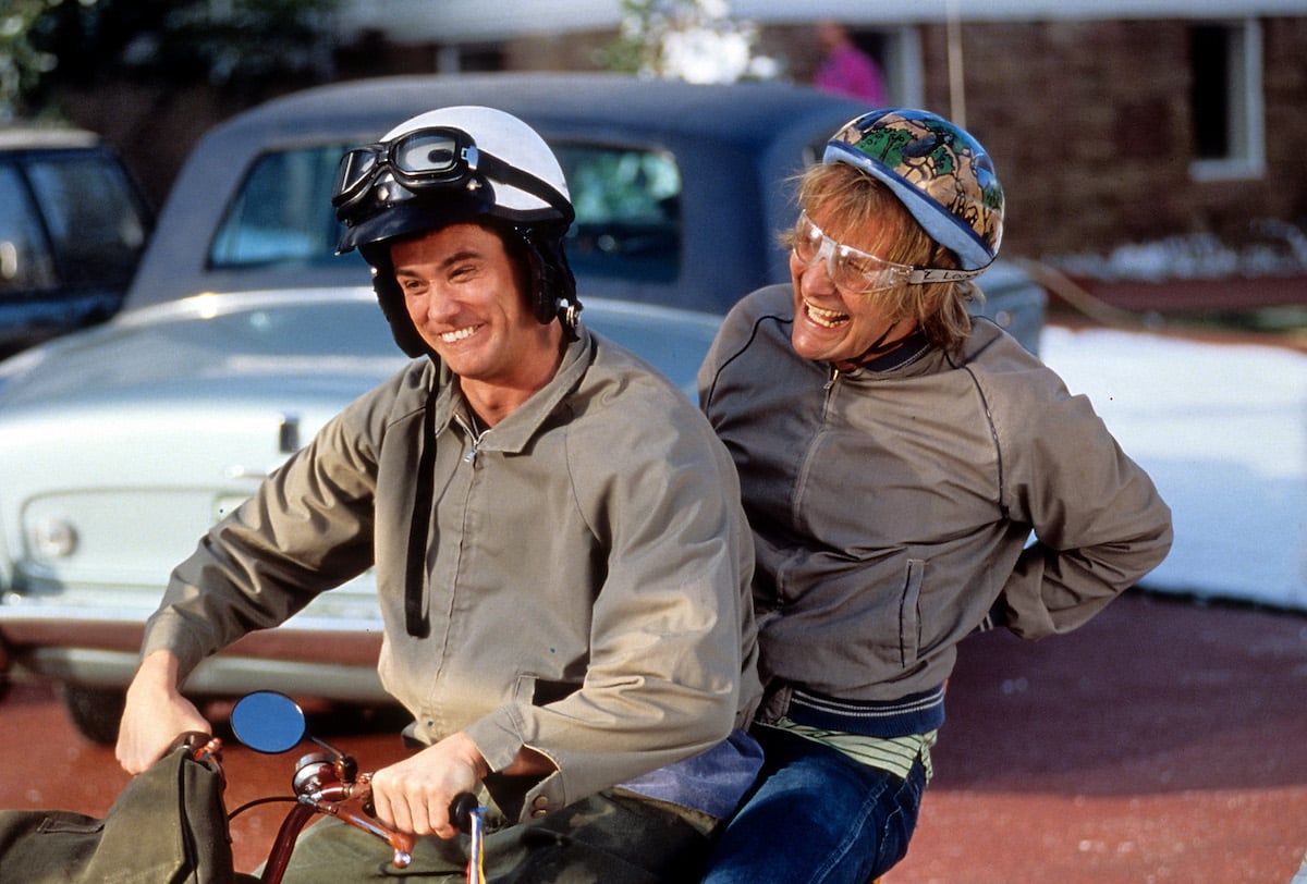 Jim Carrey and Jeff Daniels riding bike in a scene from the film 'Dumb & Dumber', 1994. 