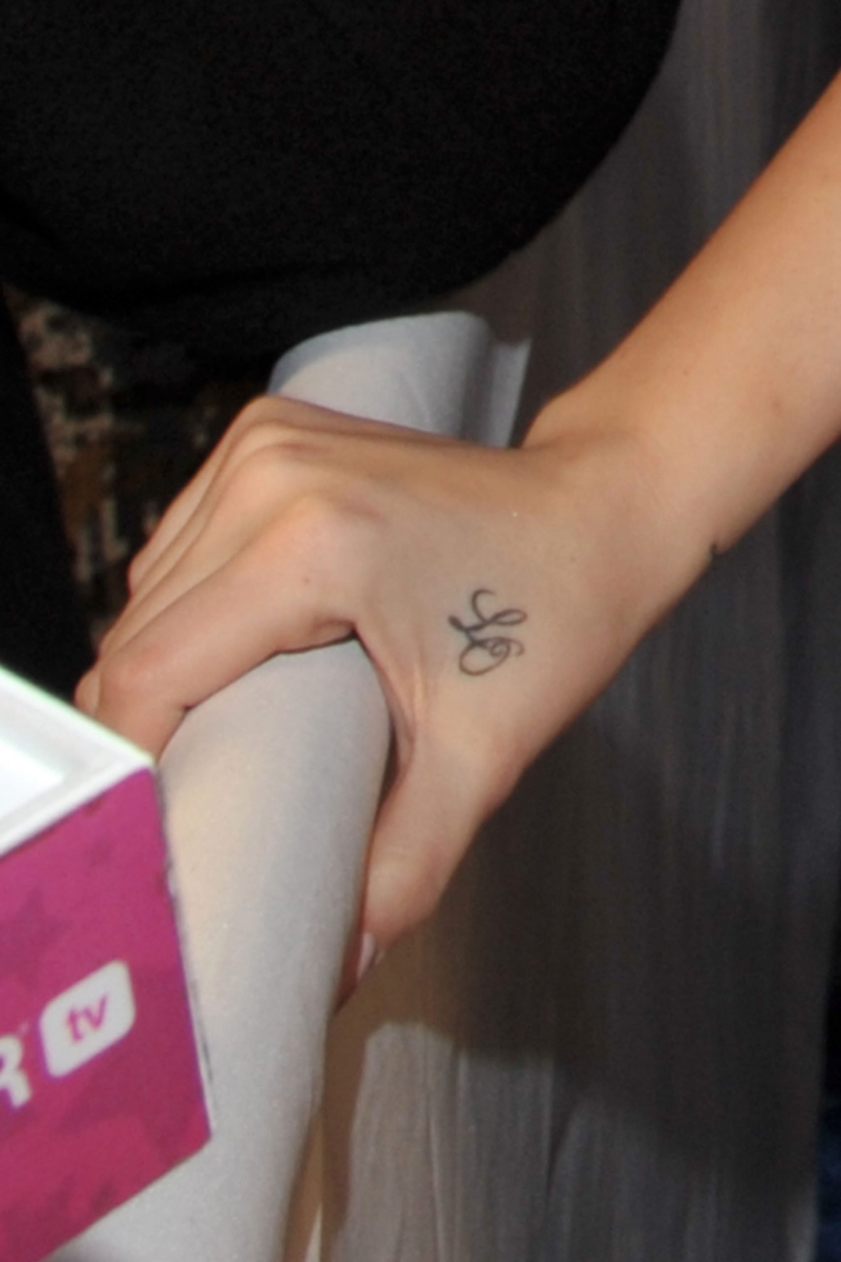 A detail shot of Khloe Kardashian's Lamar Odom tattoo as she arrives at the 2011 People's Choice Awards at Nokia Theatre L.A. Live on January 5, 2011 in Los Angeles, California.
