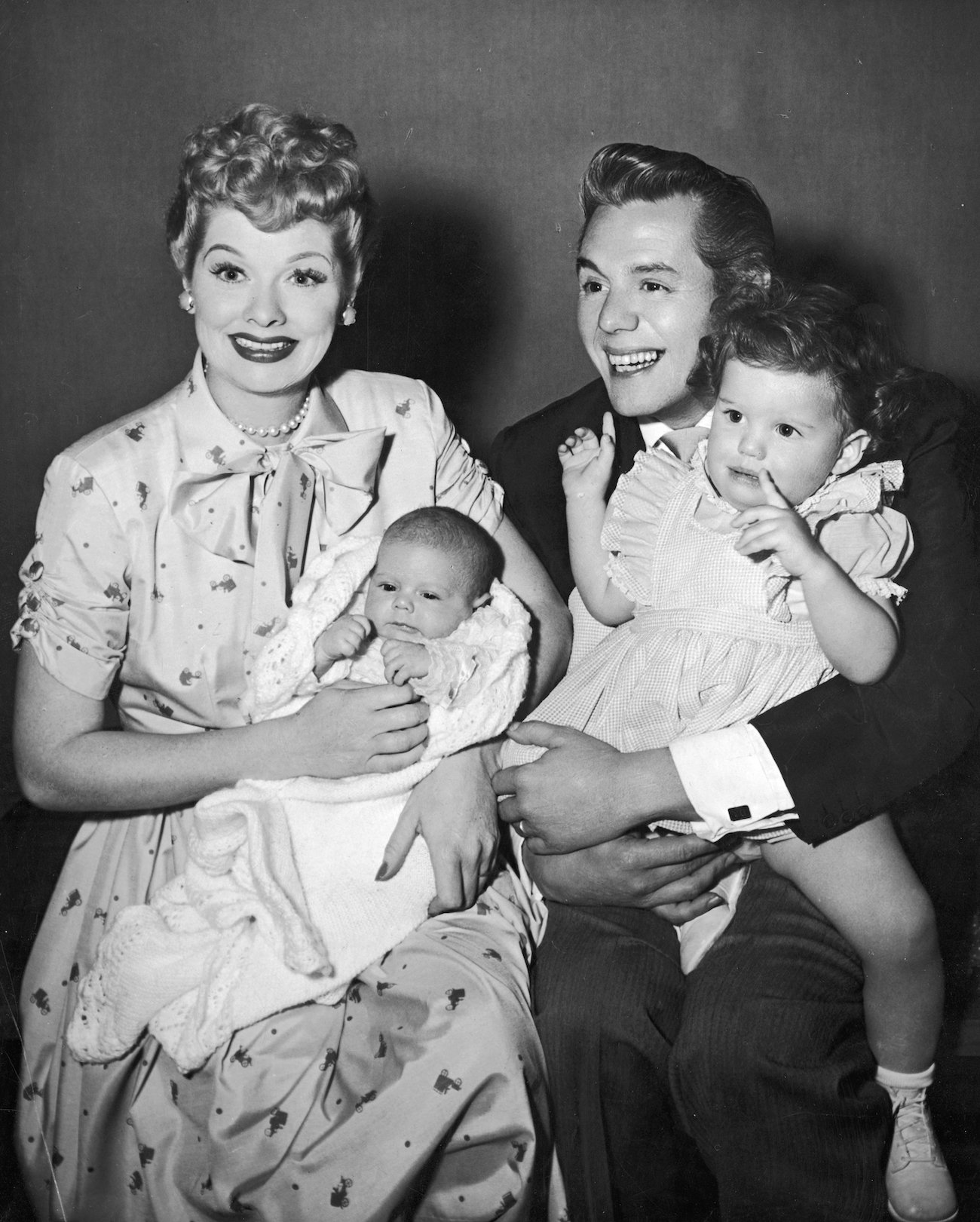 Lucille Ball and Desi Arnaz with their two children, Desi Jr. (left) and Lucie