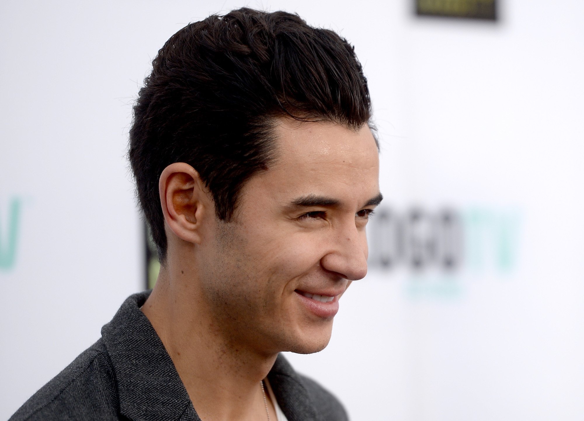 Mike Dow smiling, turned from the camera