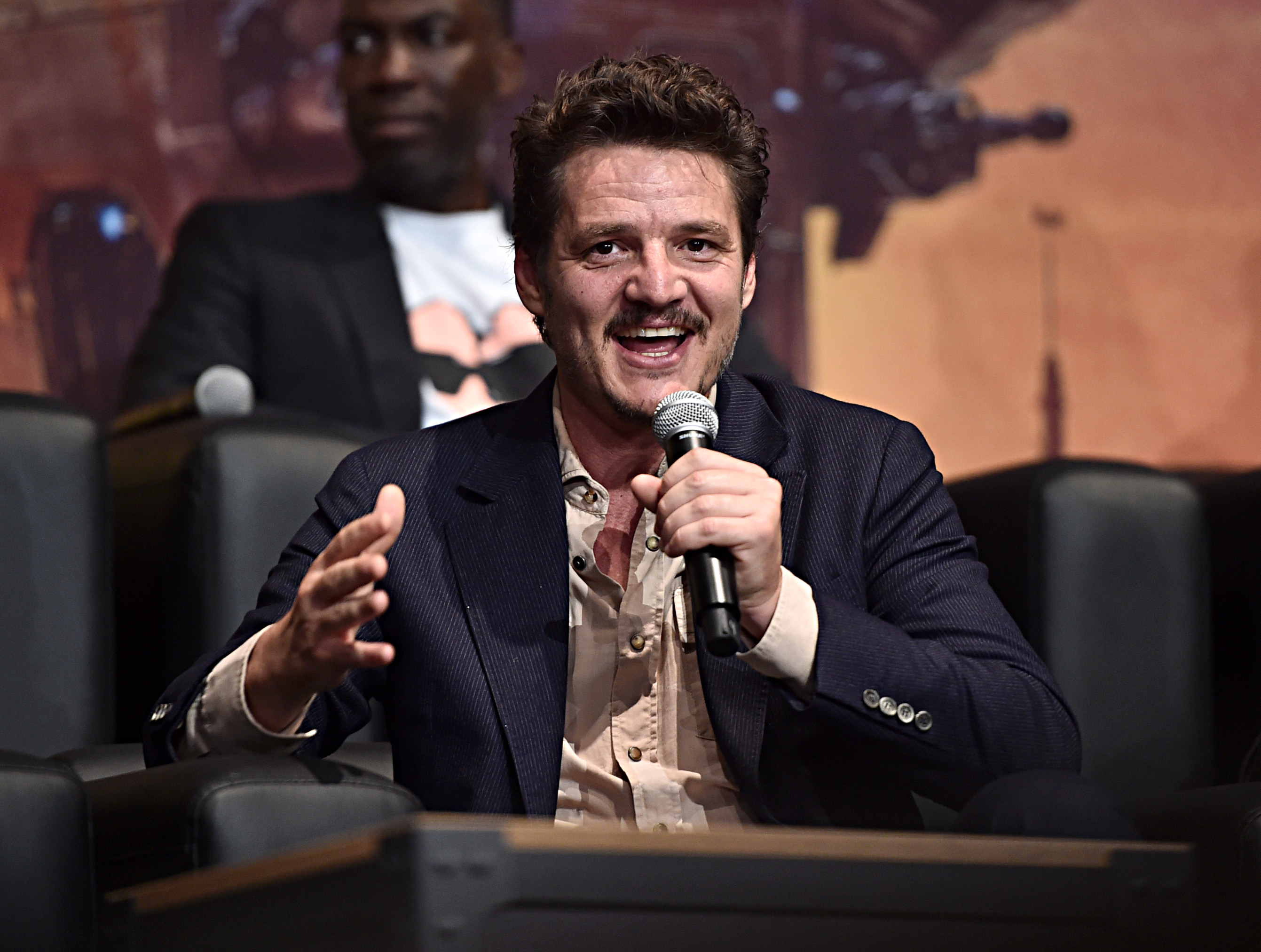 Pedro Pascal speaks onstage at the premiere of Lucasfilm's first-ever, live-action series, 'The Mandalorian'