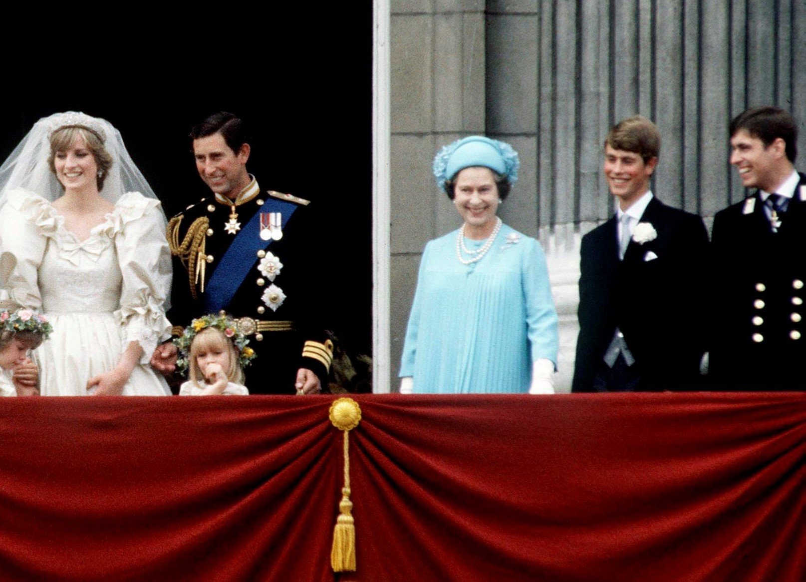 Prince Charles and Princess Diana with their bridesmaids, Queen Elizabeth II, Prince Edward, and Prince Andrew