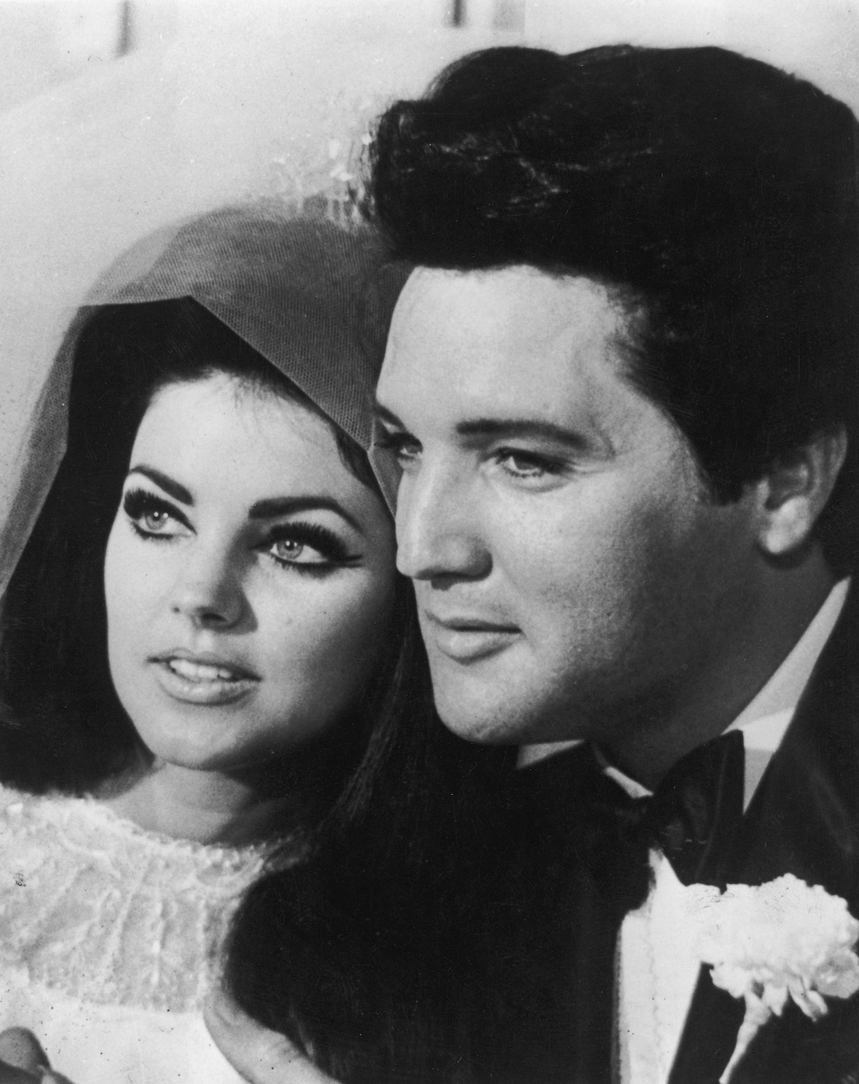American rock n' roll singer and actor Elvis Presley with his bride Priscilla Beaulieu after their wedding in Las Vegas