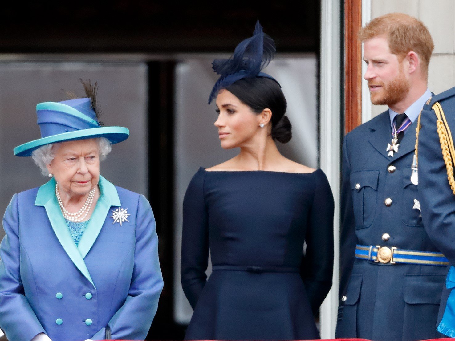 Queen Elizabeth II, Meghan Markle, and Prince Harry