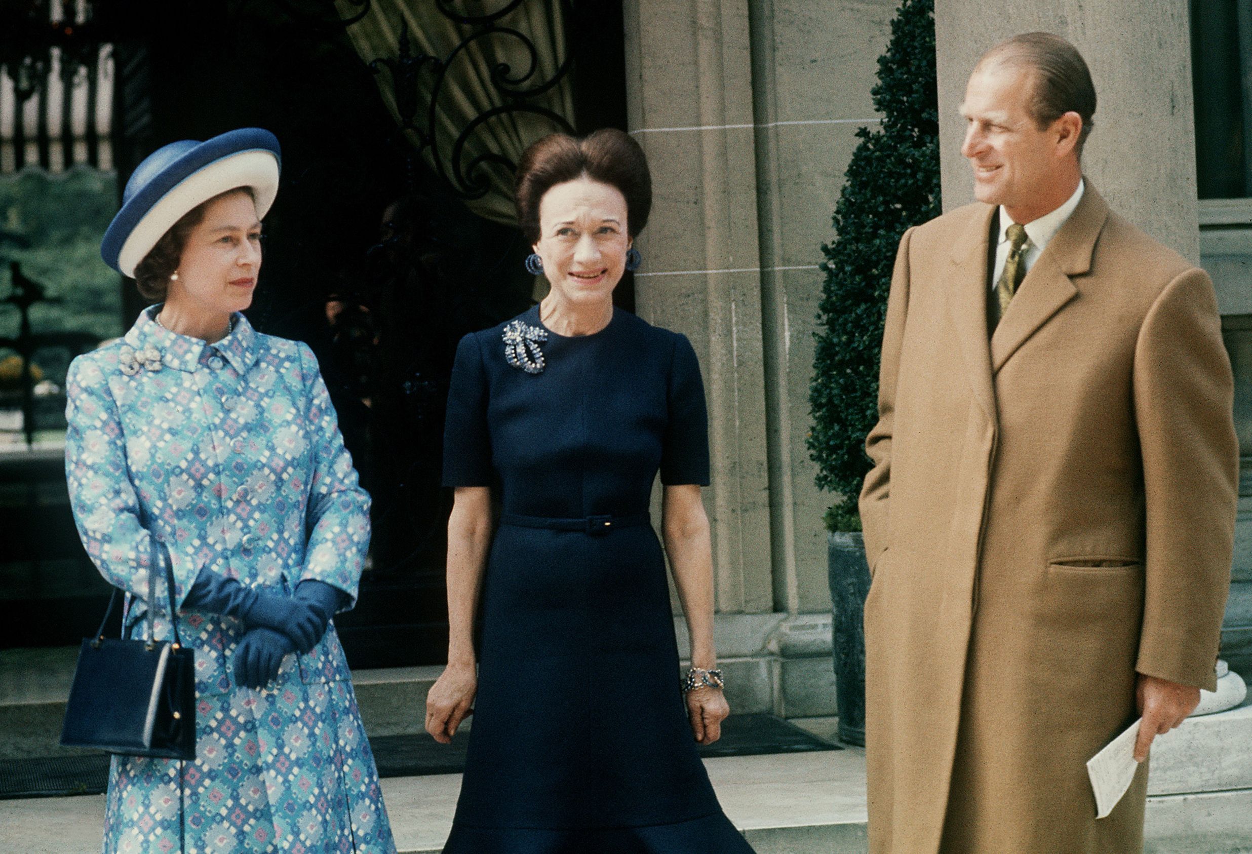 Queen Elizabeth II, Prince Philip, and Wallis Simpson (C) in Paris