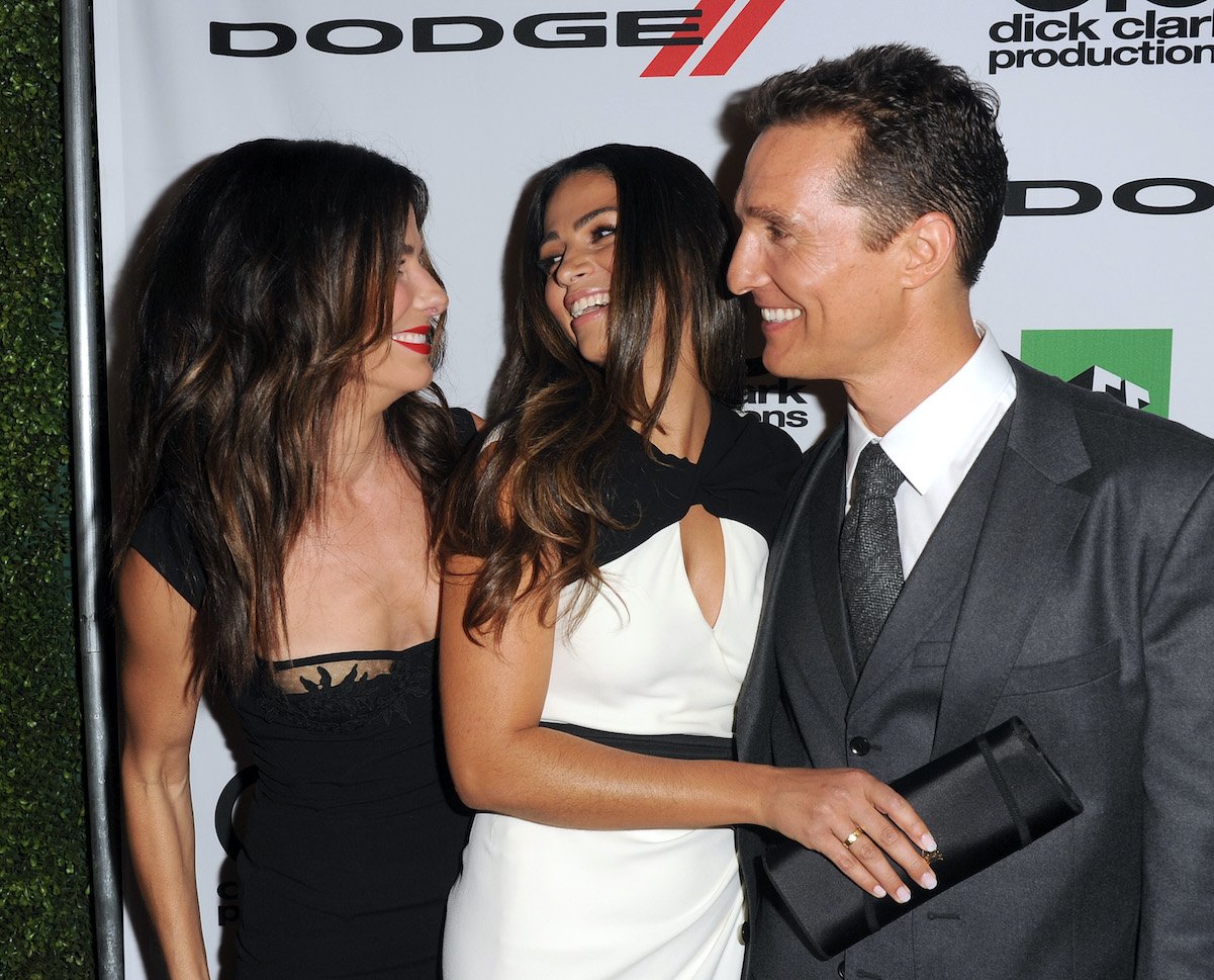Sandra Bullock (left) with Camila Alves and Matthew McConaughey 