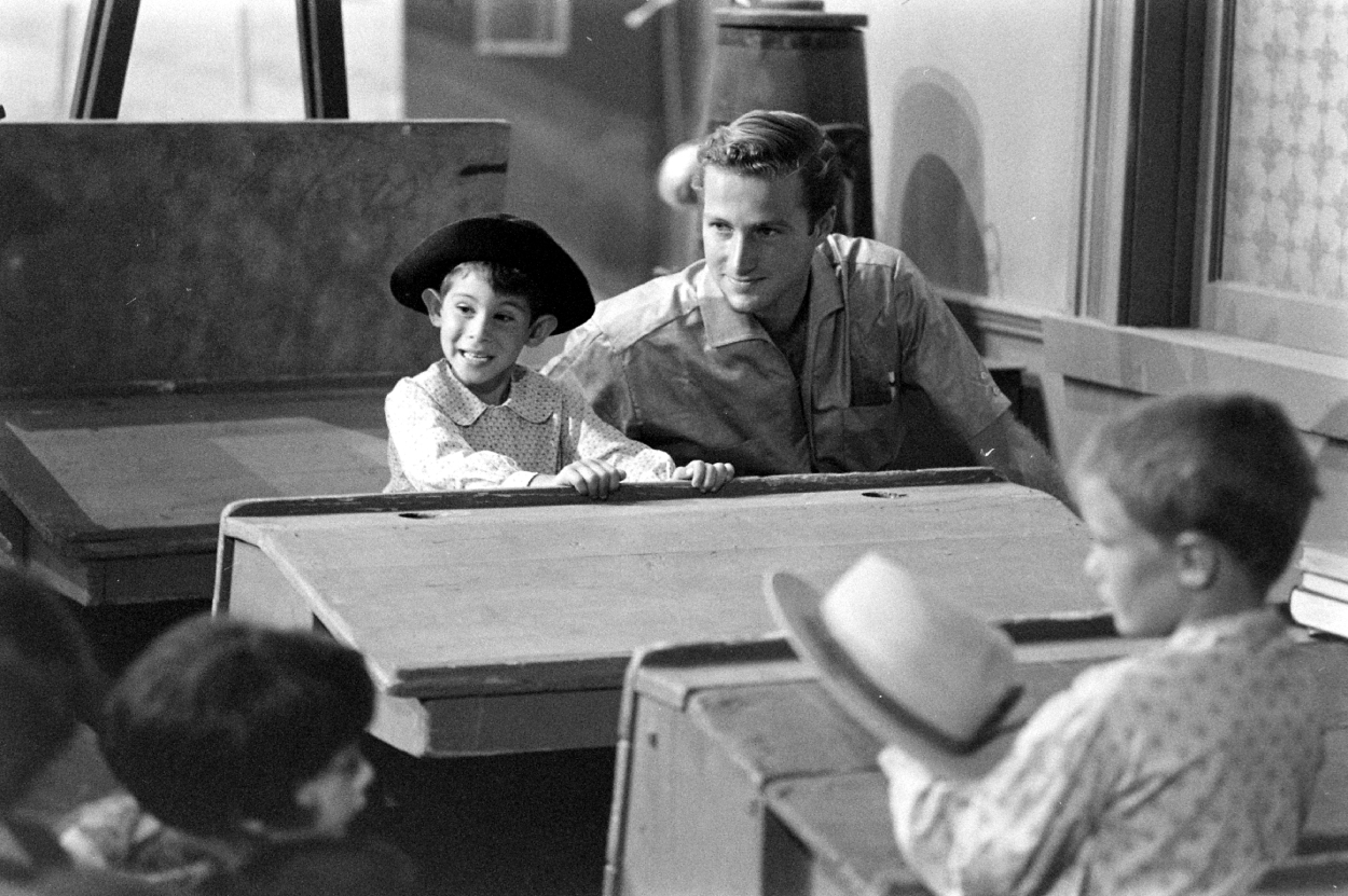John Ernest Crawford sitting near a child in television series The Rifleman