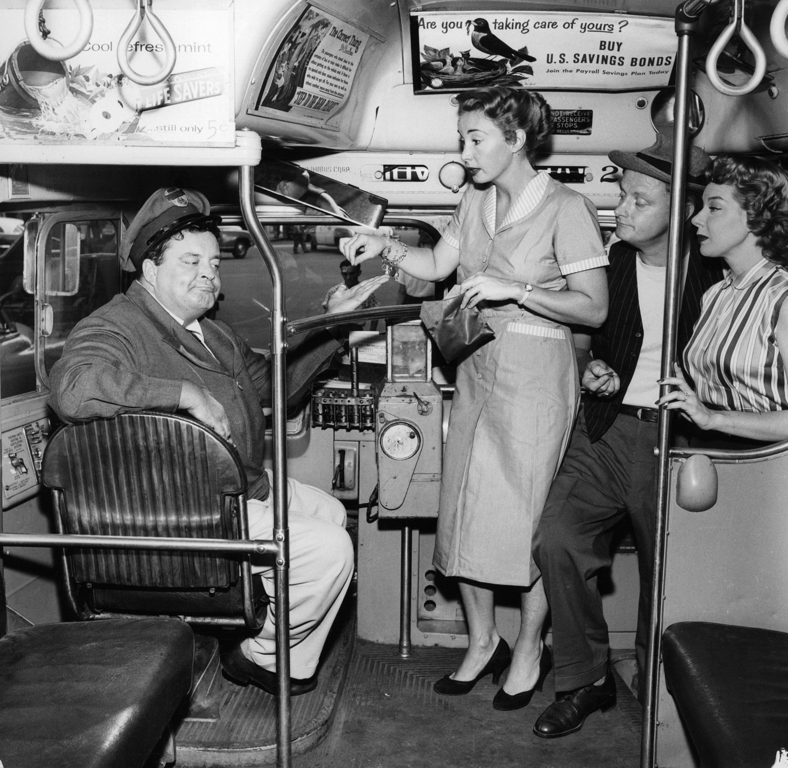 Jackie Gleason, Audrey Meadows, Art Carney and Joyce Randolph on the bus in a promotional portrait for 'The Honeymooners'