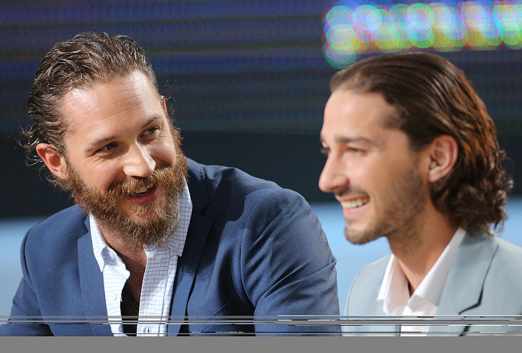 (L-R) Tom Hardy and Shia LaBeouf smiling