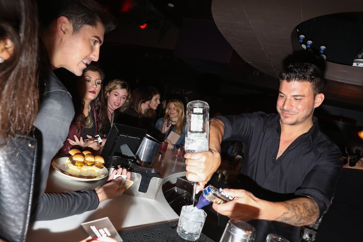 Cast member Jax Taylor tends bar at No. 8 at VanderCrawl